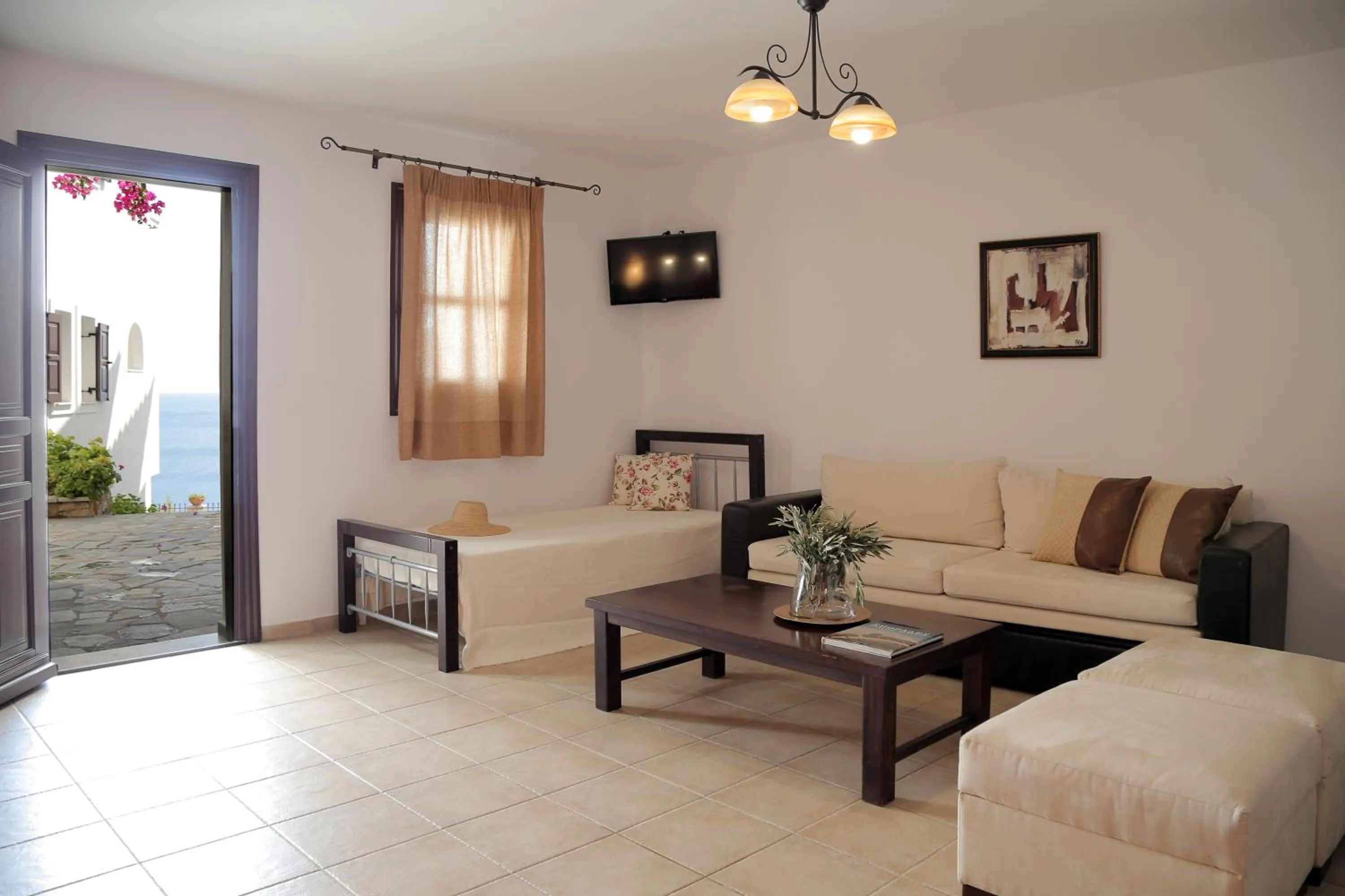 Seating area, Bed in Yalis Hotel