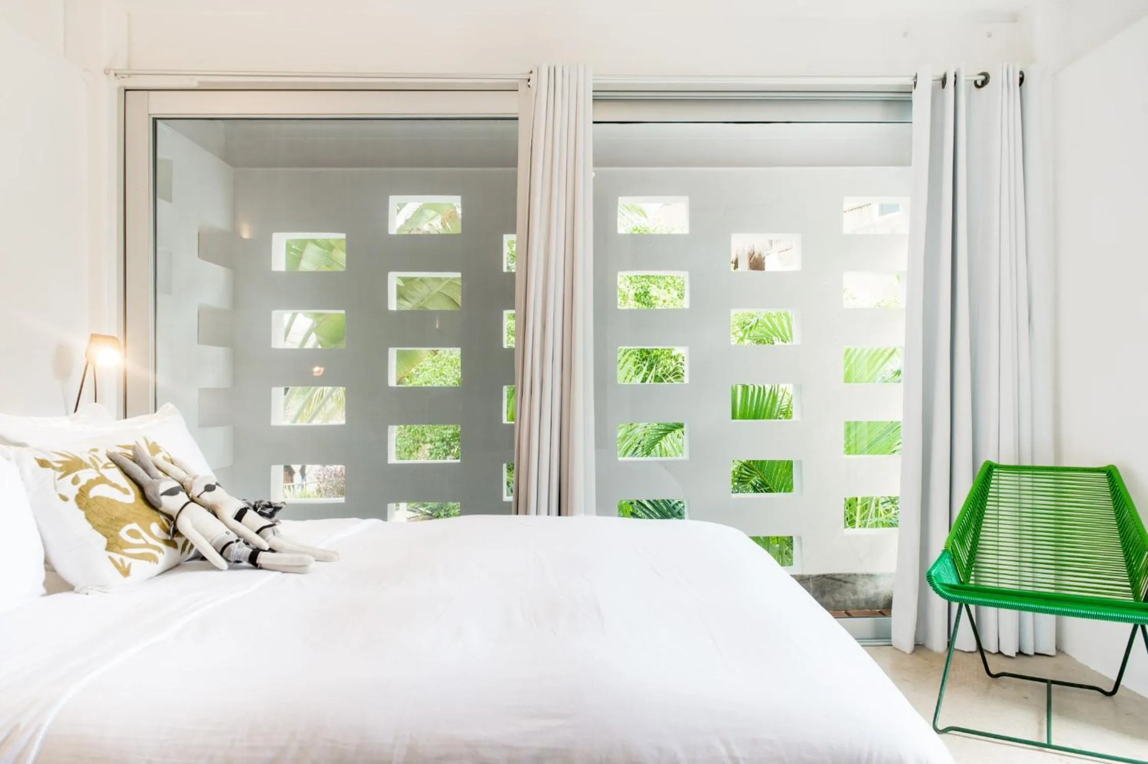 Bed in Casa de Piedra Tulum