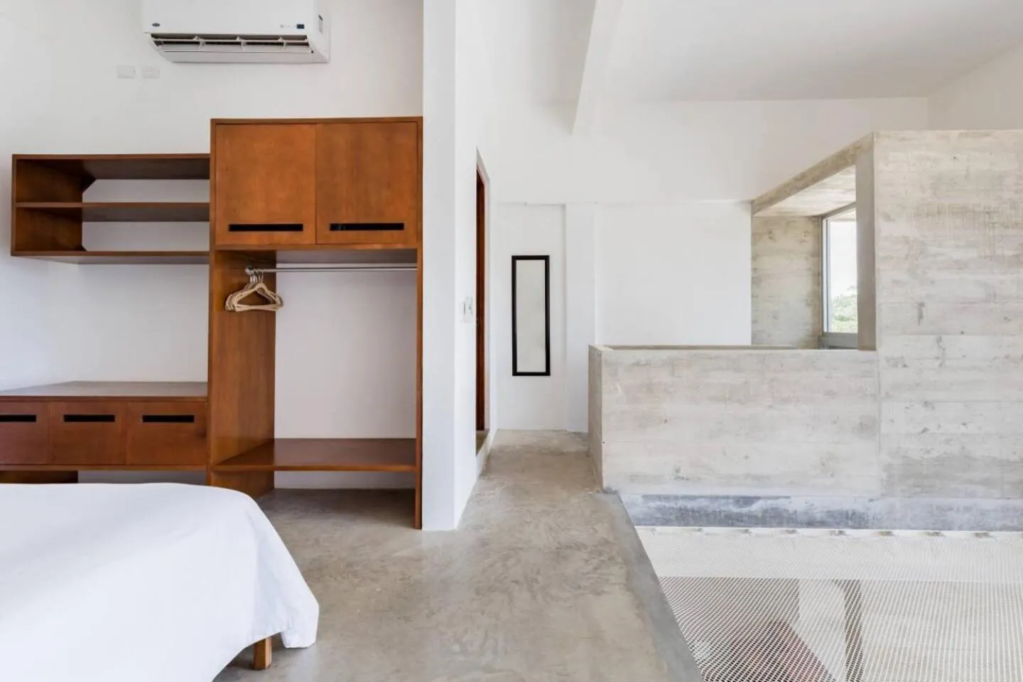 Bed in Casa de Piedra Tulum