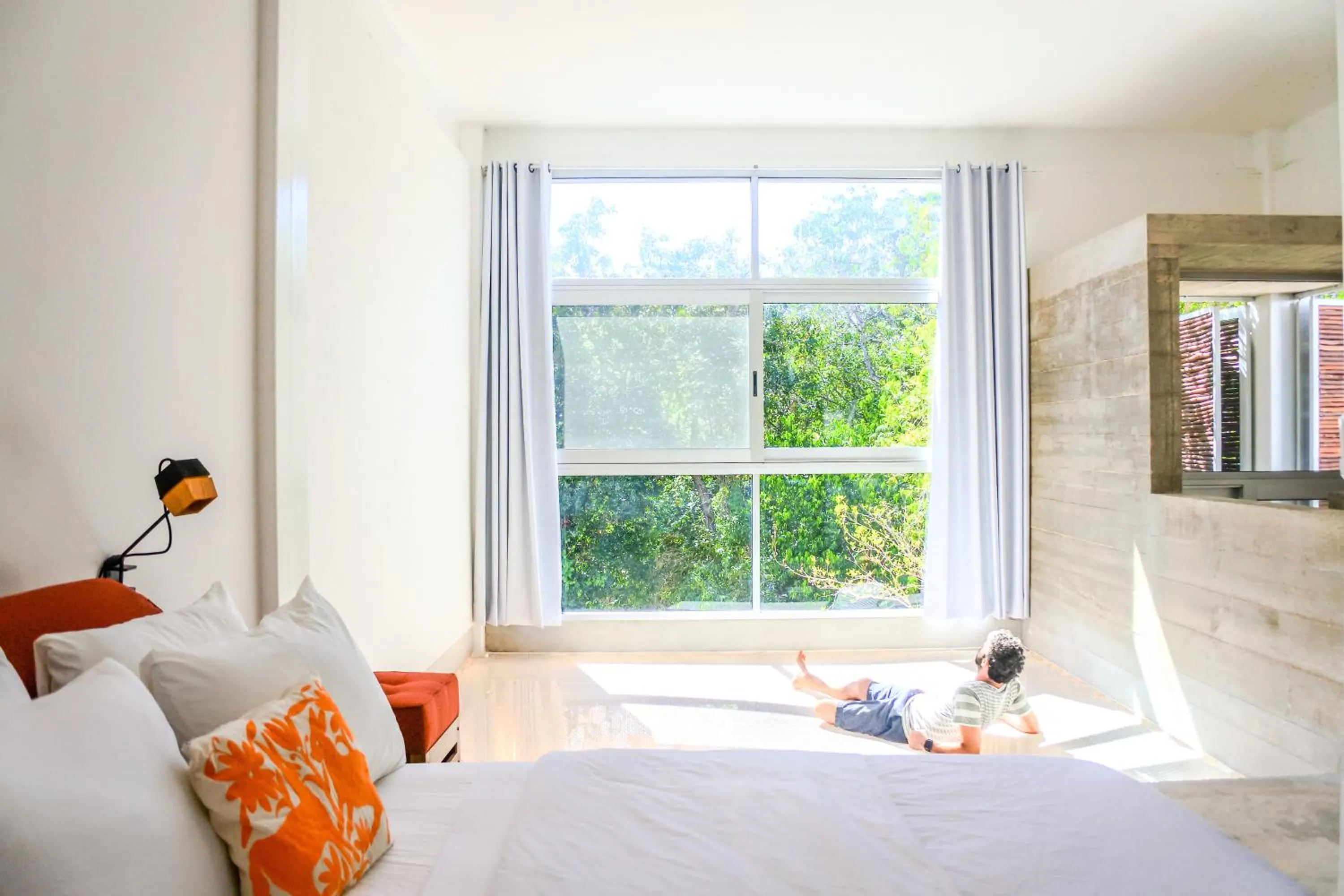 Seating area, Bed in Casa de Piedra Tulum