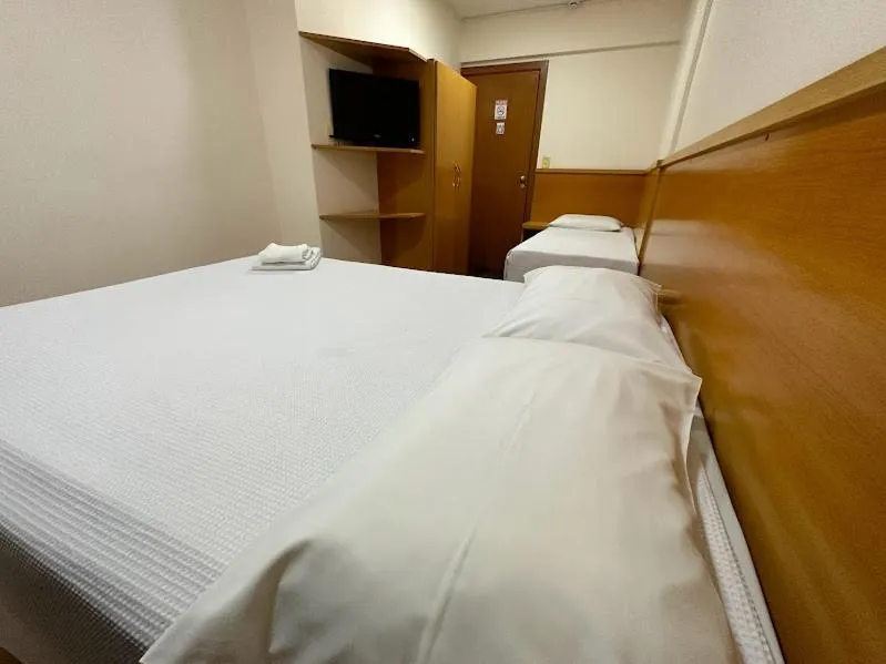 Bed in Condall Palace Hotel