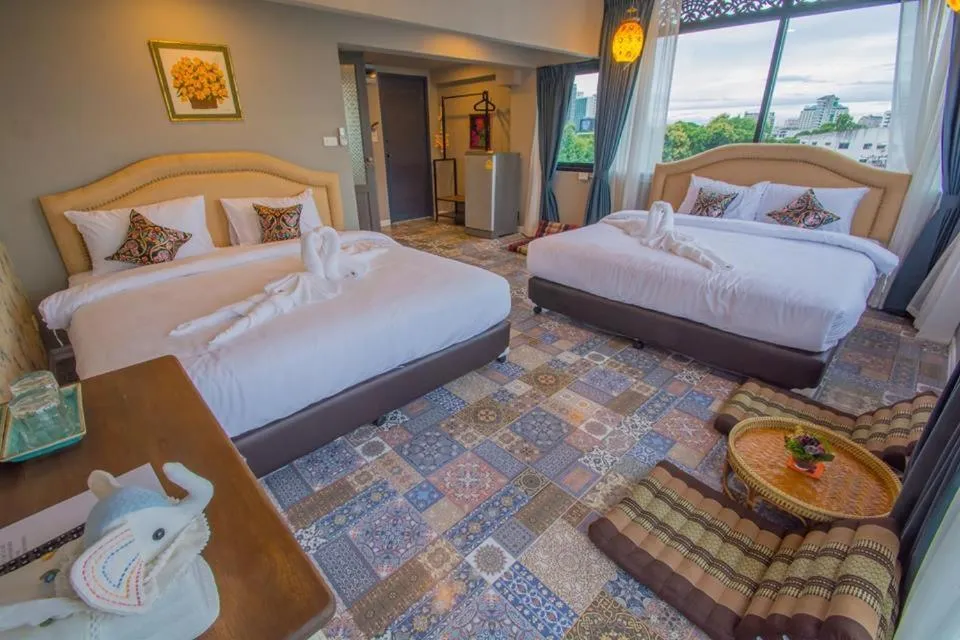 Photo of the whole room, Bed in Sridonchai Heritage, Night Bazaar Chiang Mai