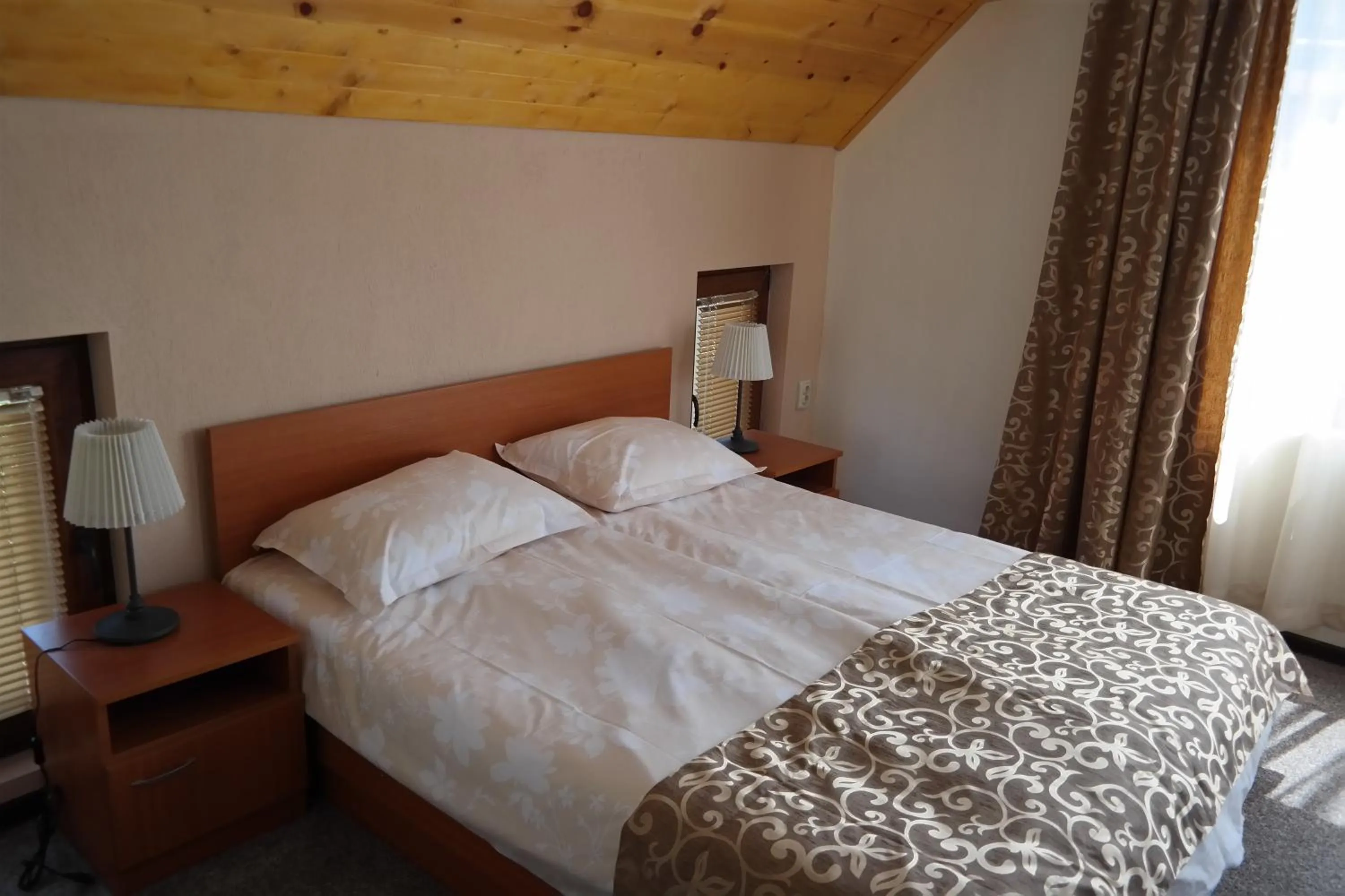 Bed in Friends Family Hotel