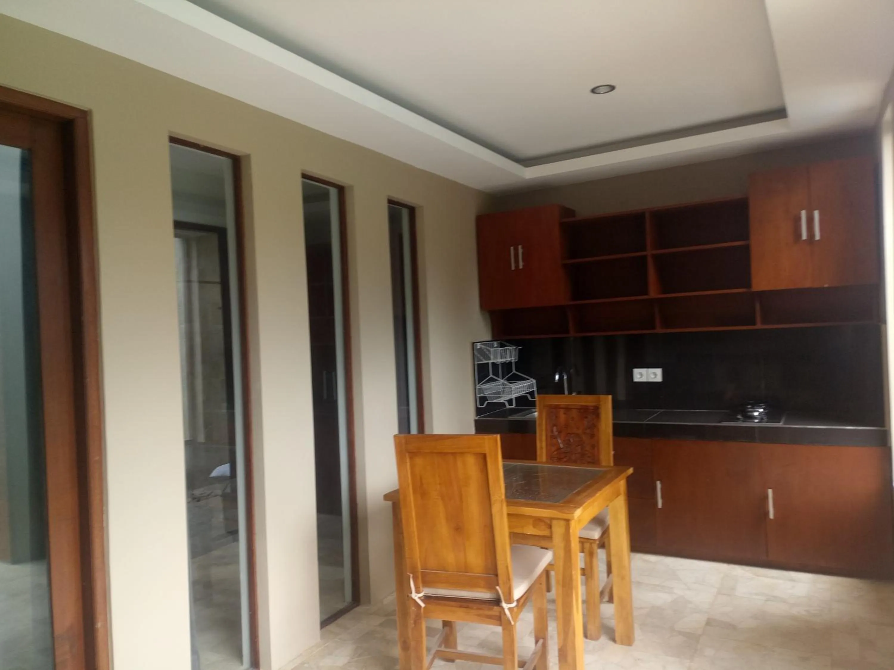 Kitchen or kitchenette in The Garden Villa