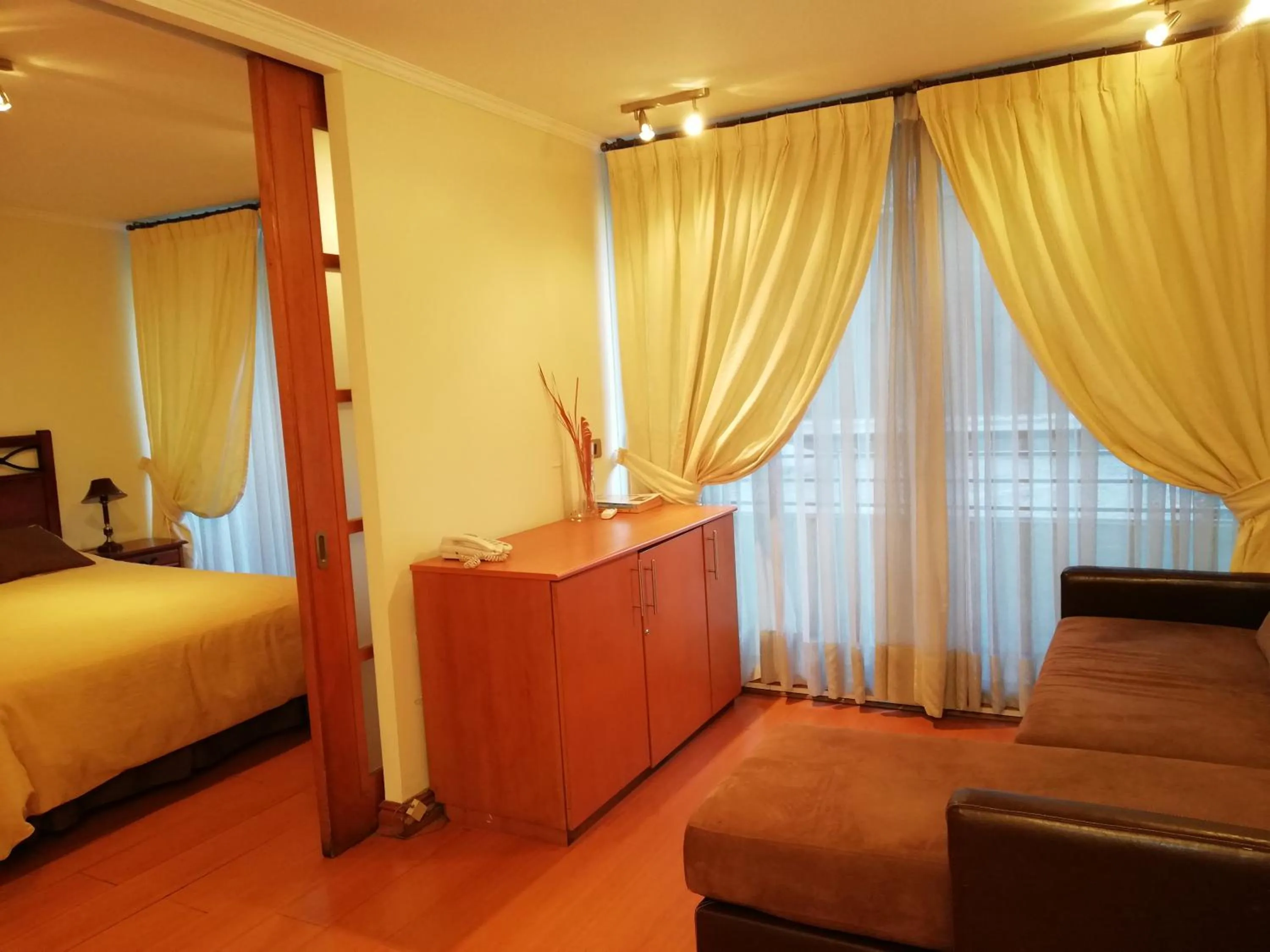 Living room, Bed in Andes Suites