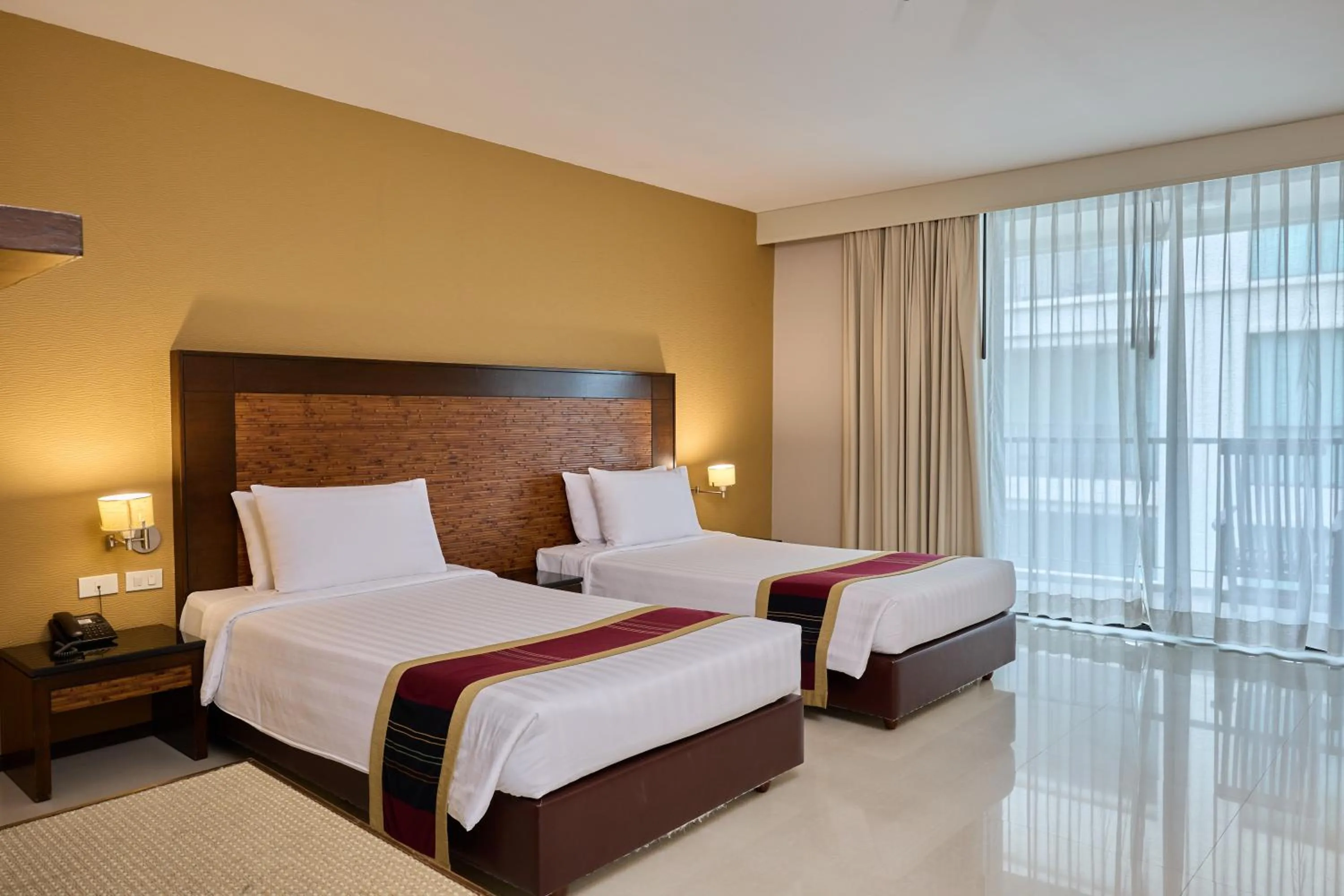 Bed in Tara Mantra Cha-Am Resort