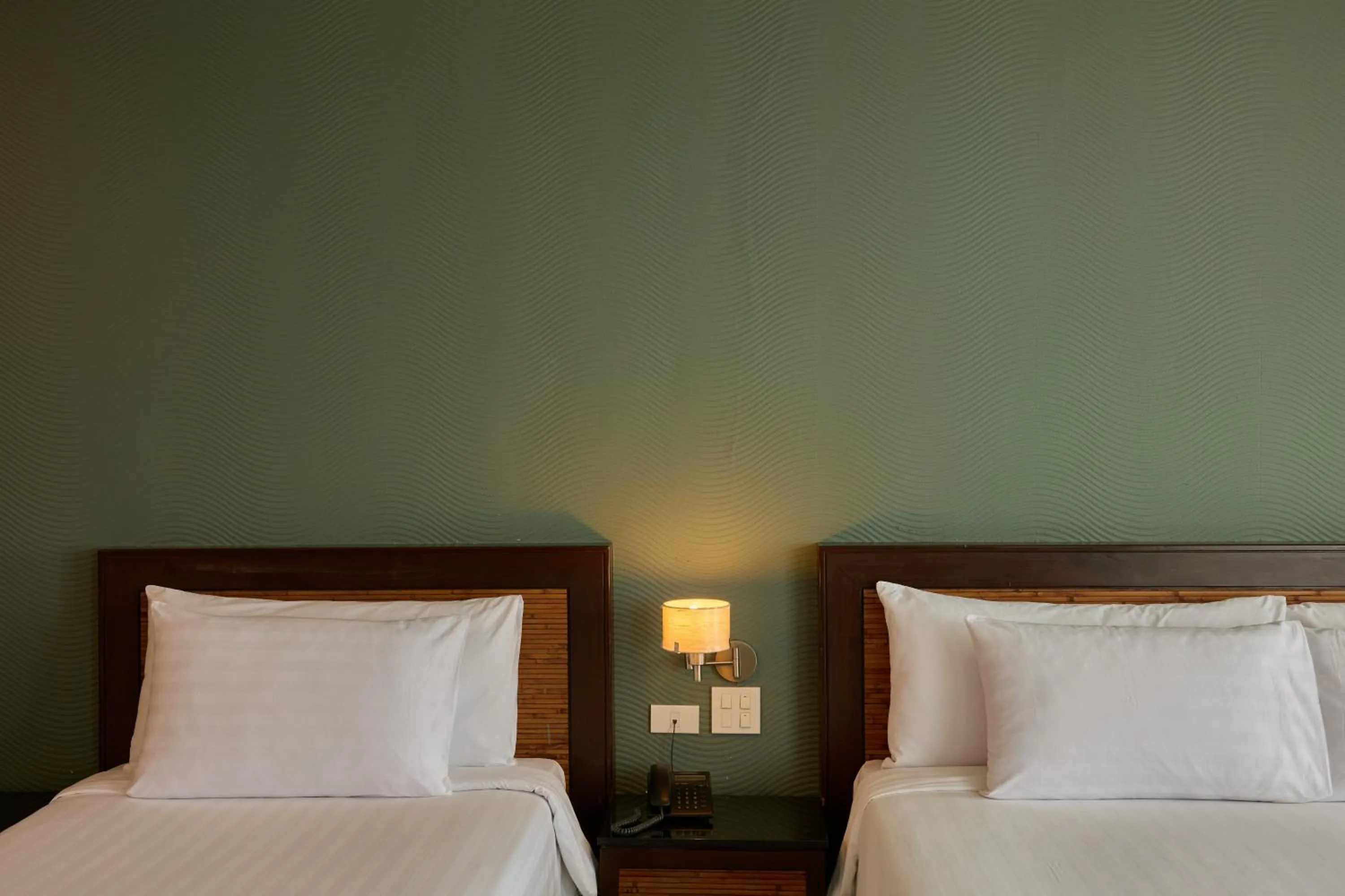 Bed in Tara Mantra Cha-Am Resort