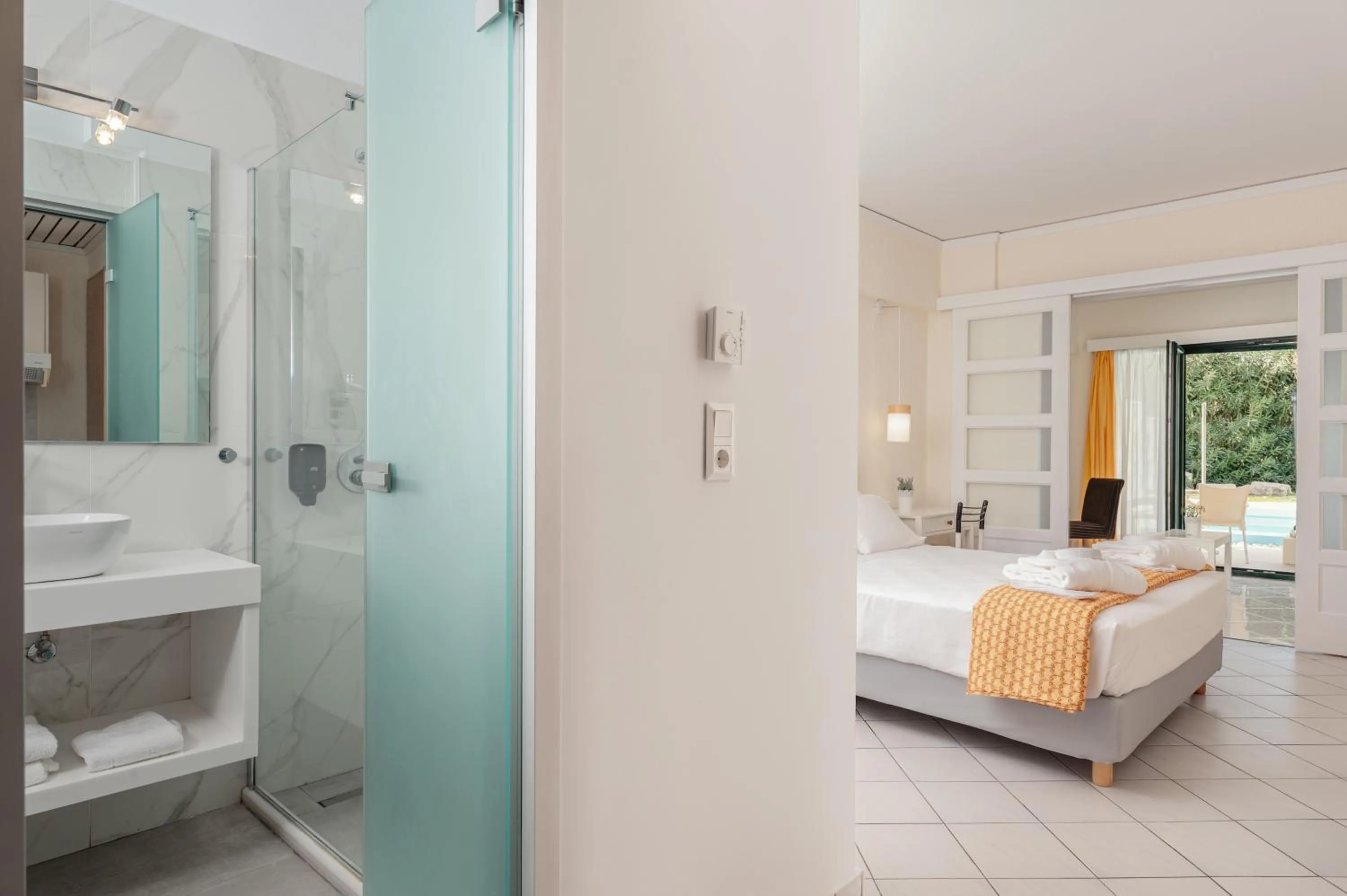 Bathroom, Bed in Hydrele Beach Hotel & Village
