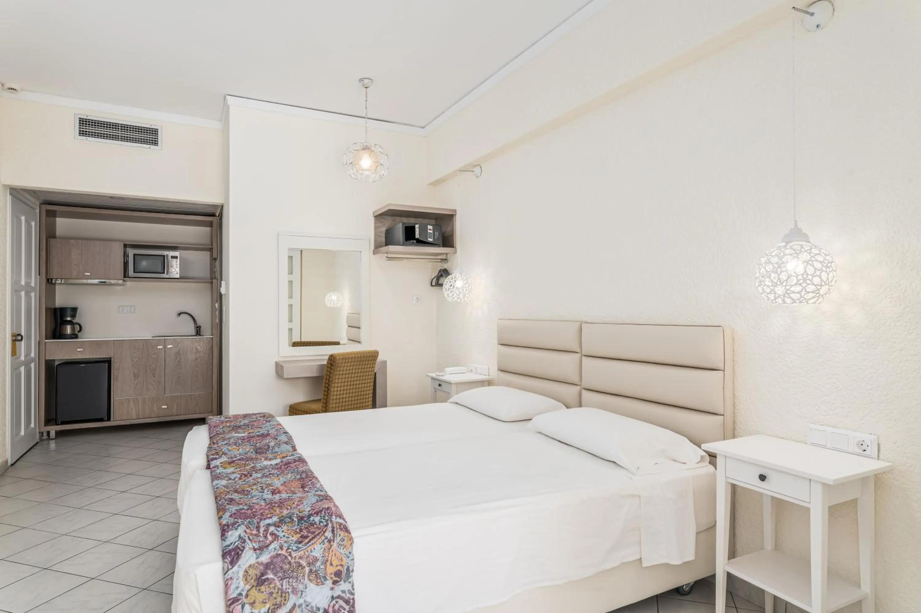 Kitchen or kitchenette, Bed in Hydrele Beach Hotel & Village