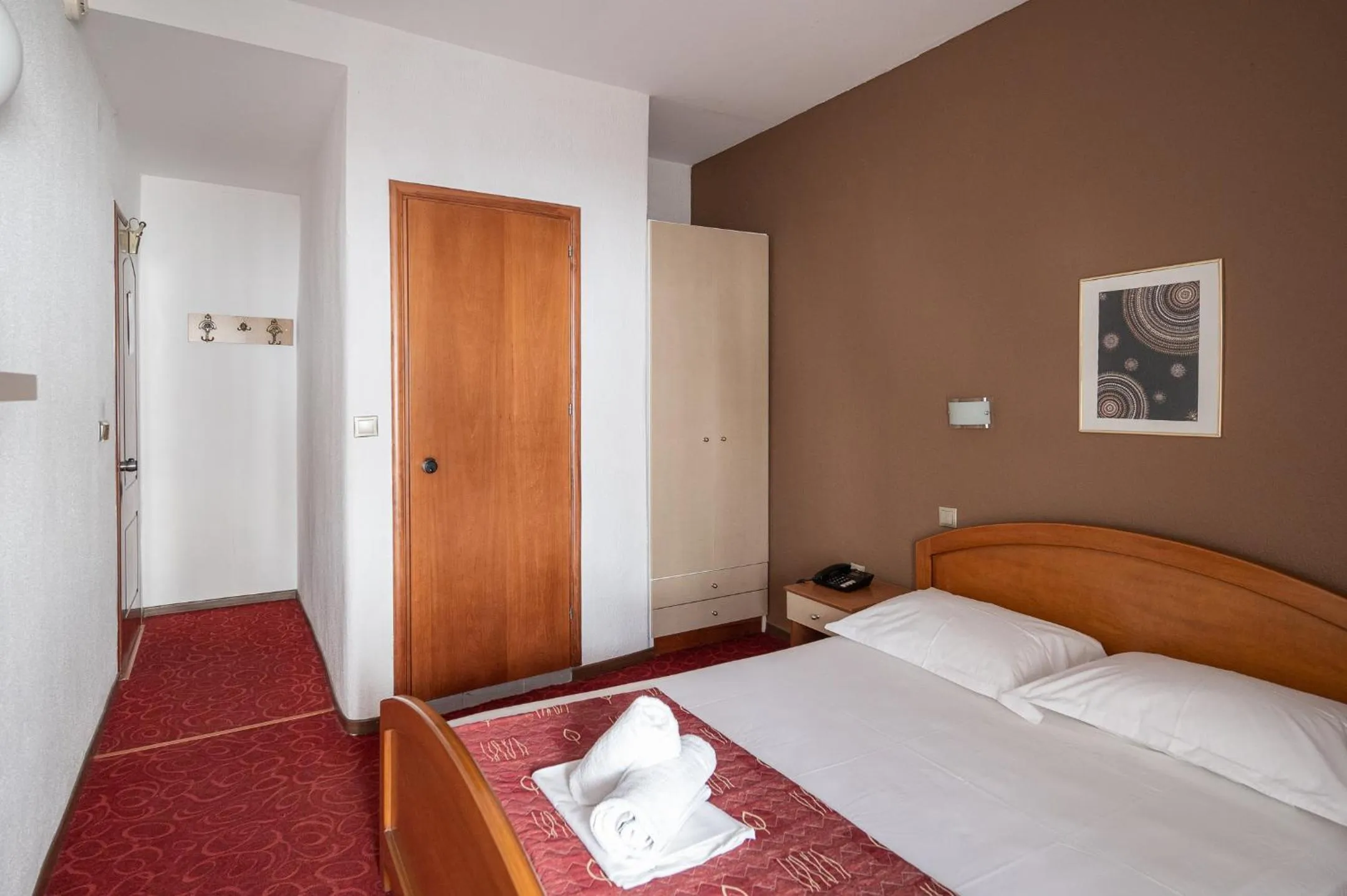 Property building, Bed in Hotel Akropol