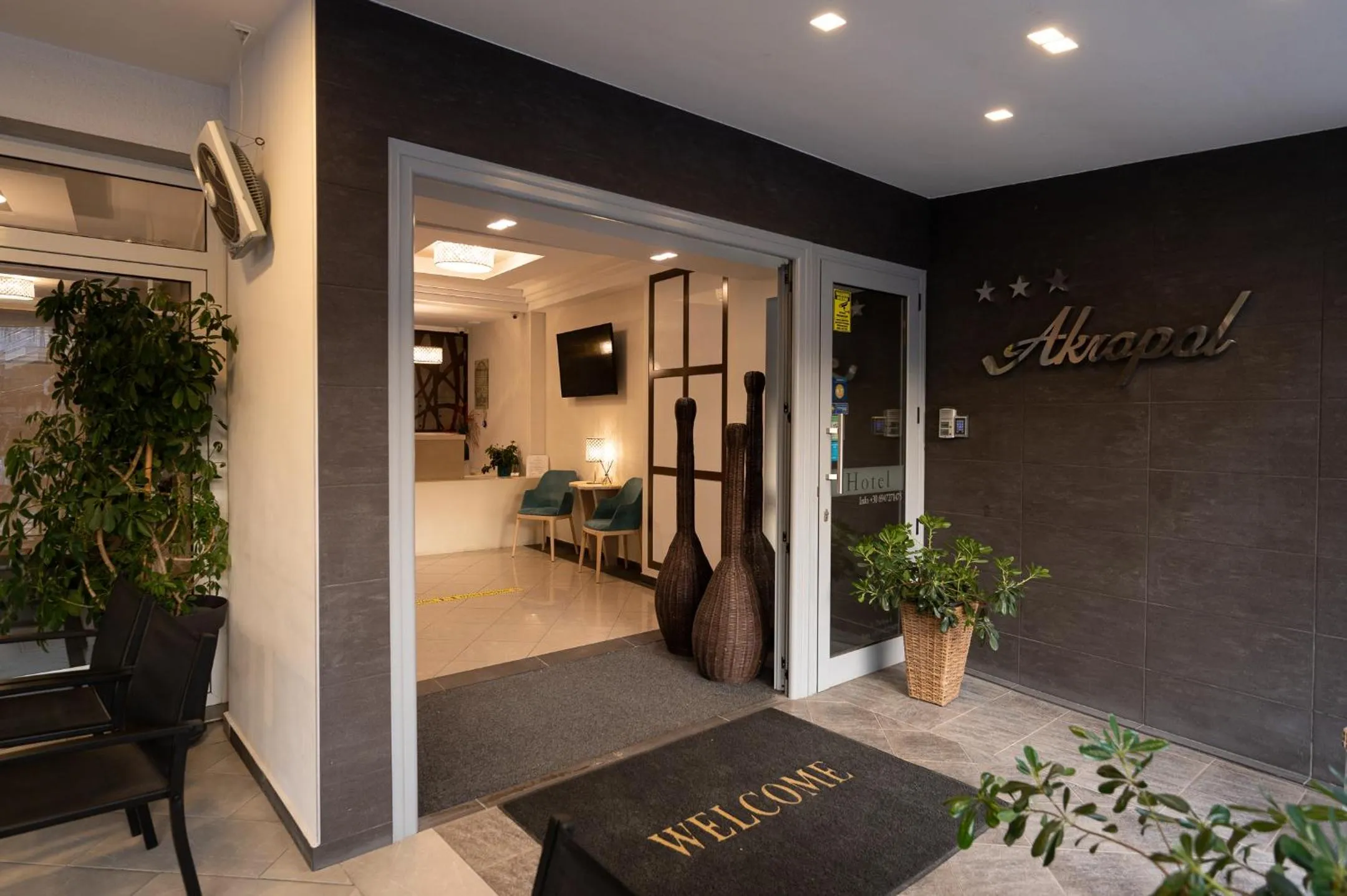 Property logo or sign in Hotel Akropol