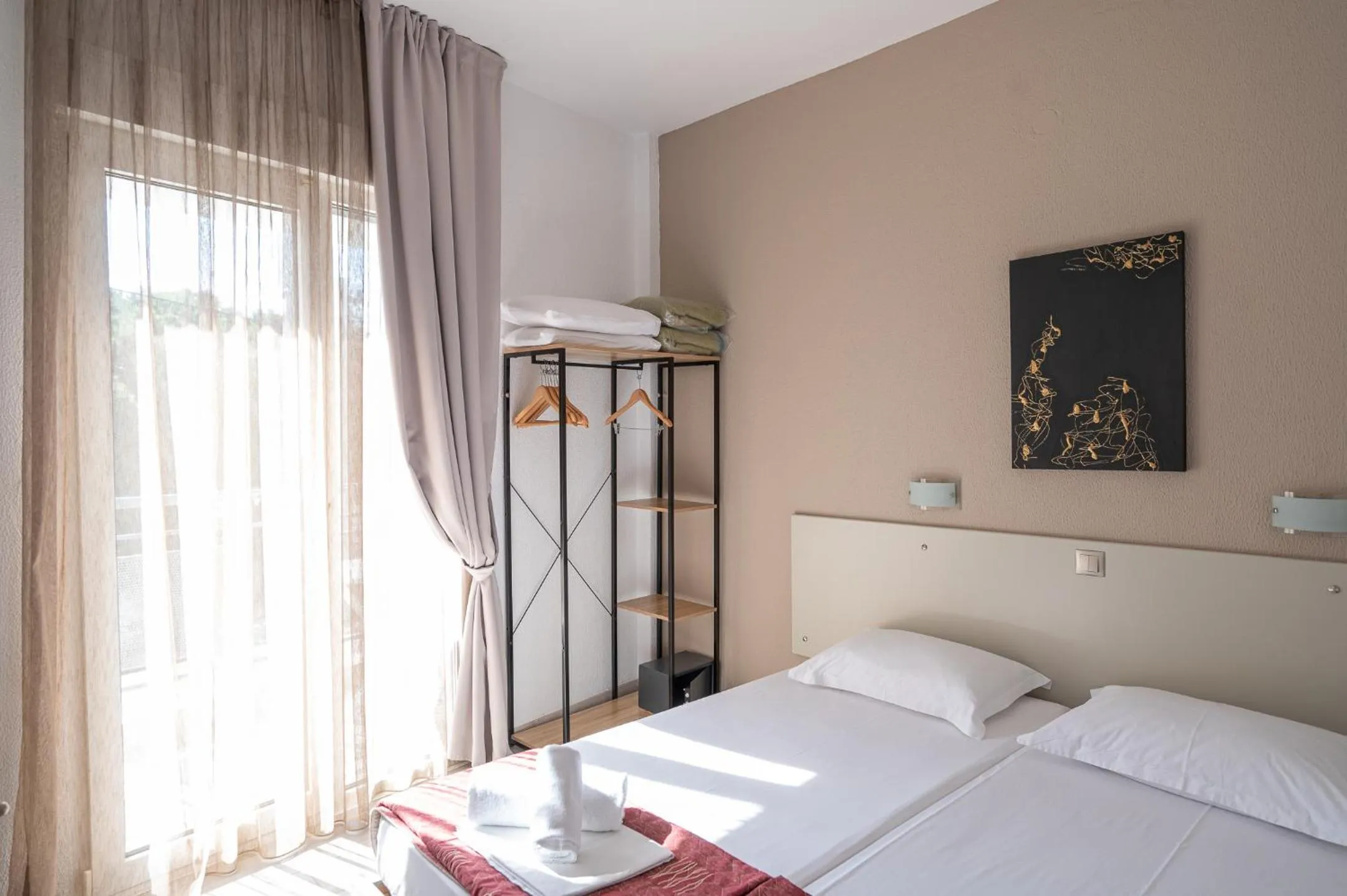 Property building, Bed in Hotel Akropol