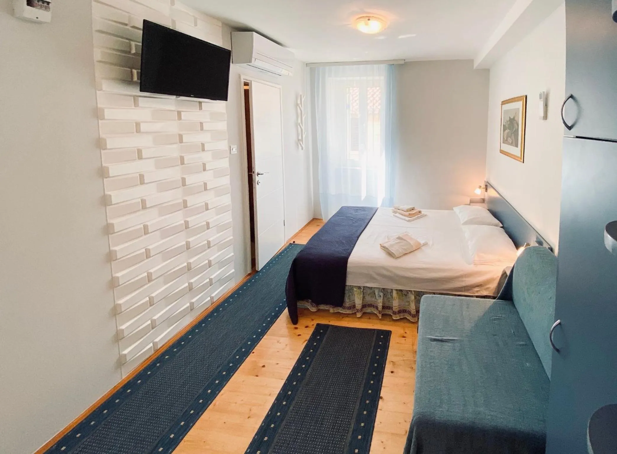 Bed in Komiza Provita Guesthouse