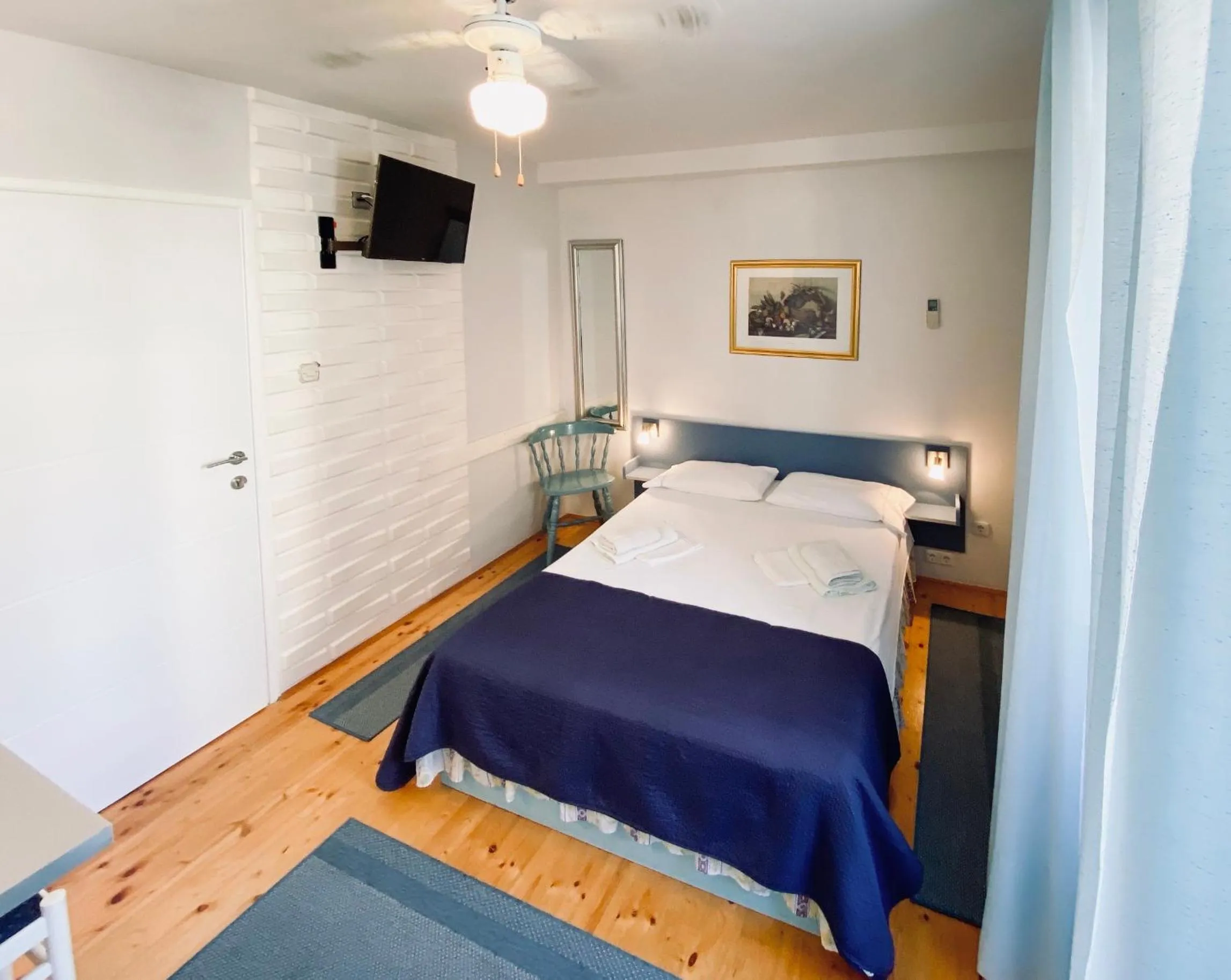 Bed in Komiza Provita Guesthouse