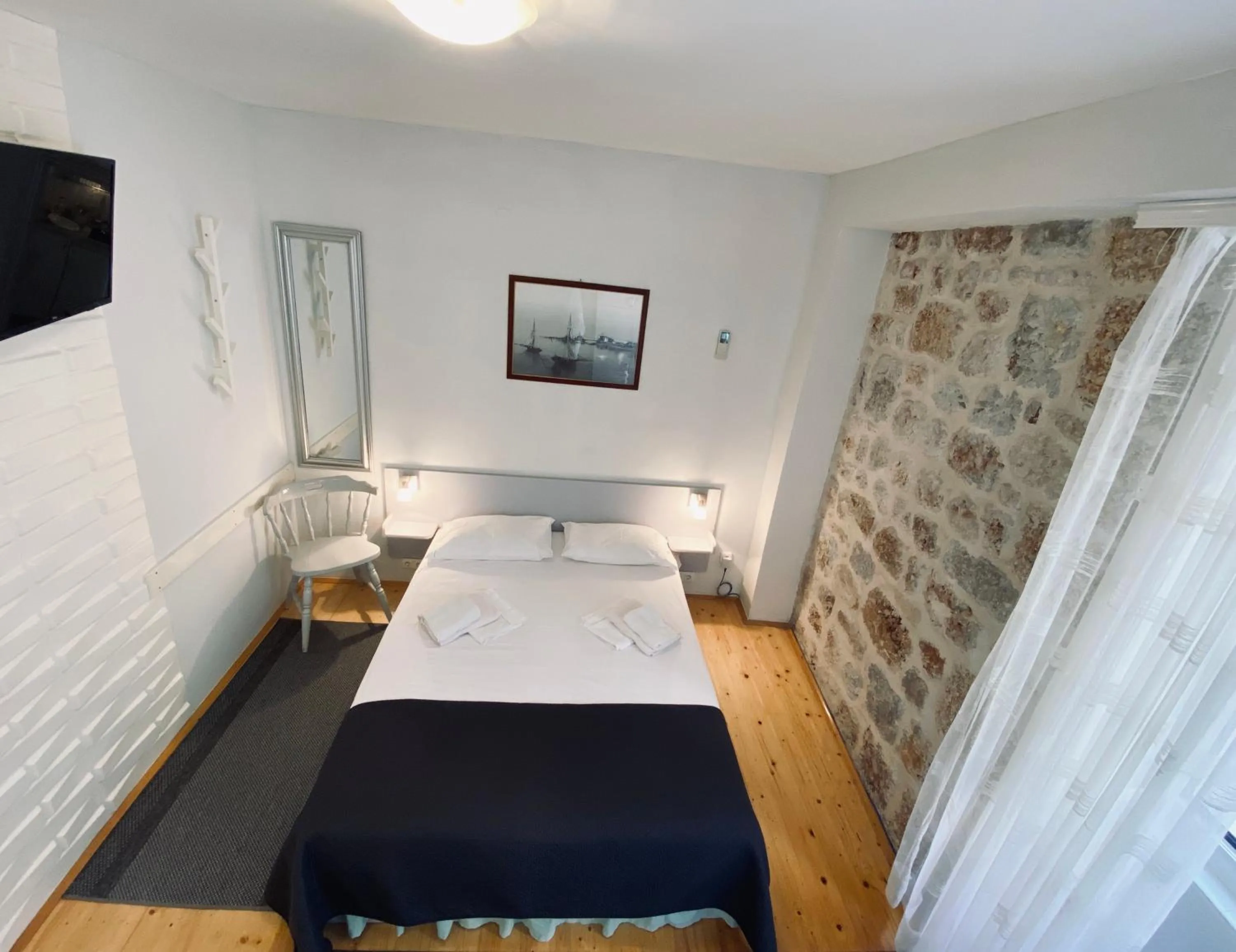 Bed in Komiza Provita Guesthouse