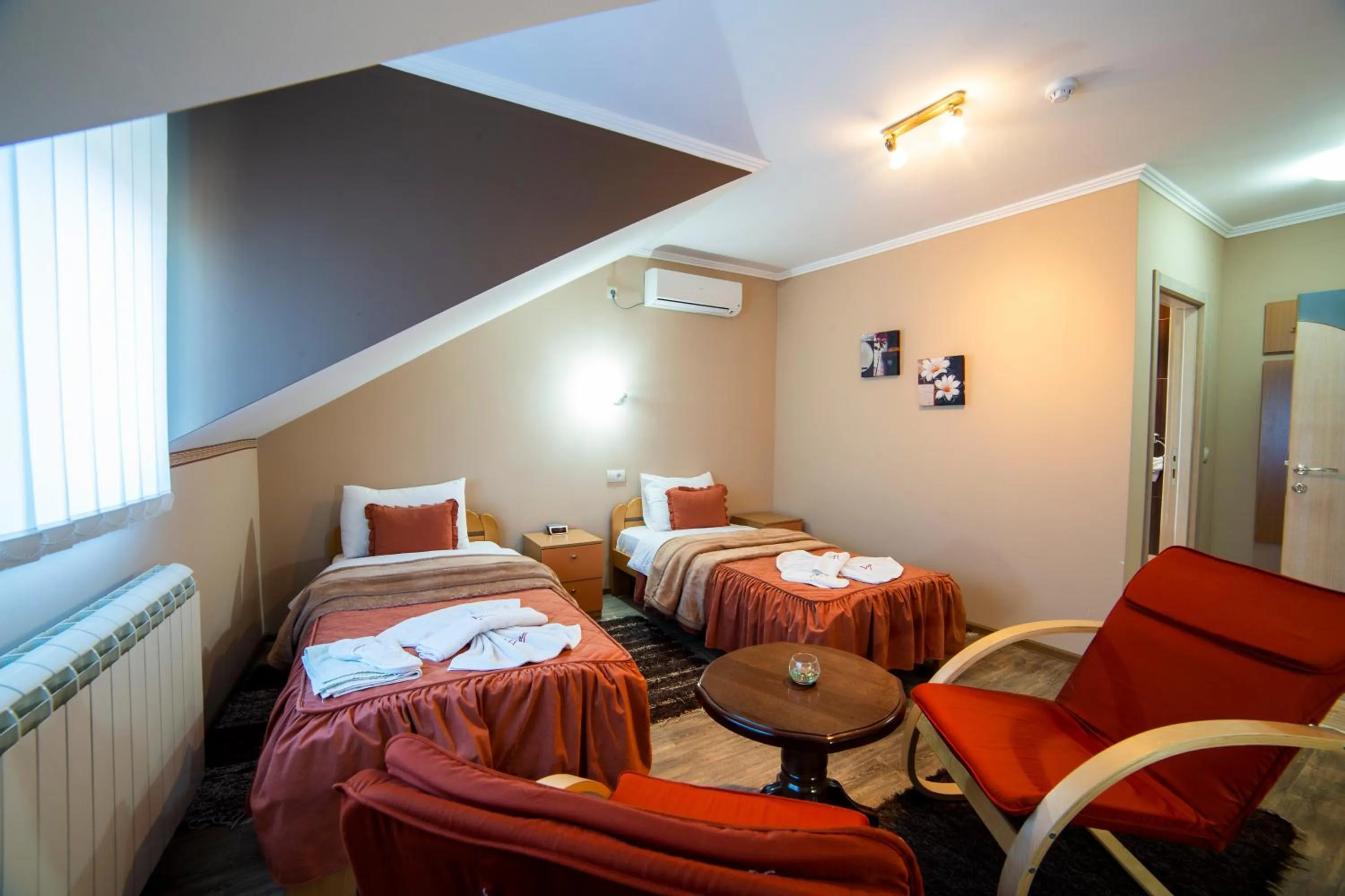 Bed in Garni Hotel Lama