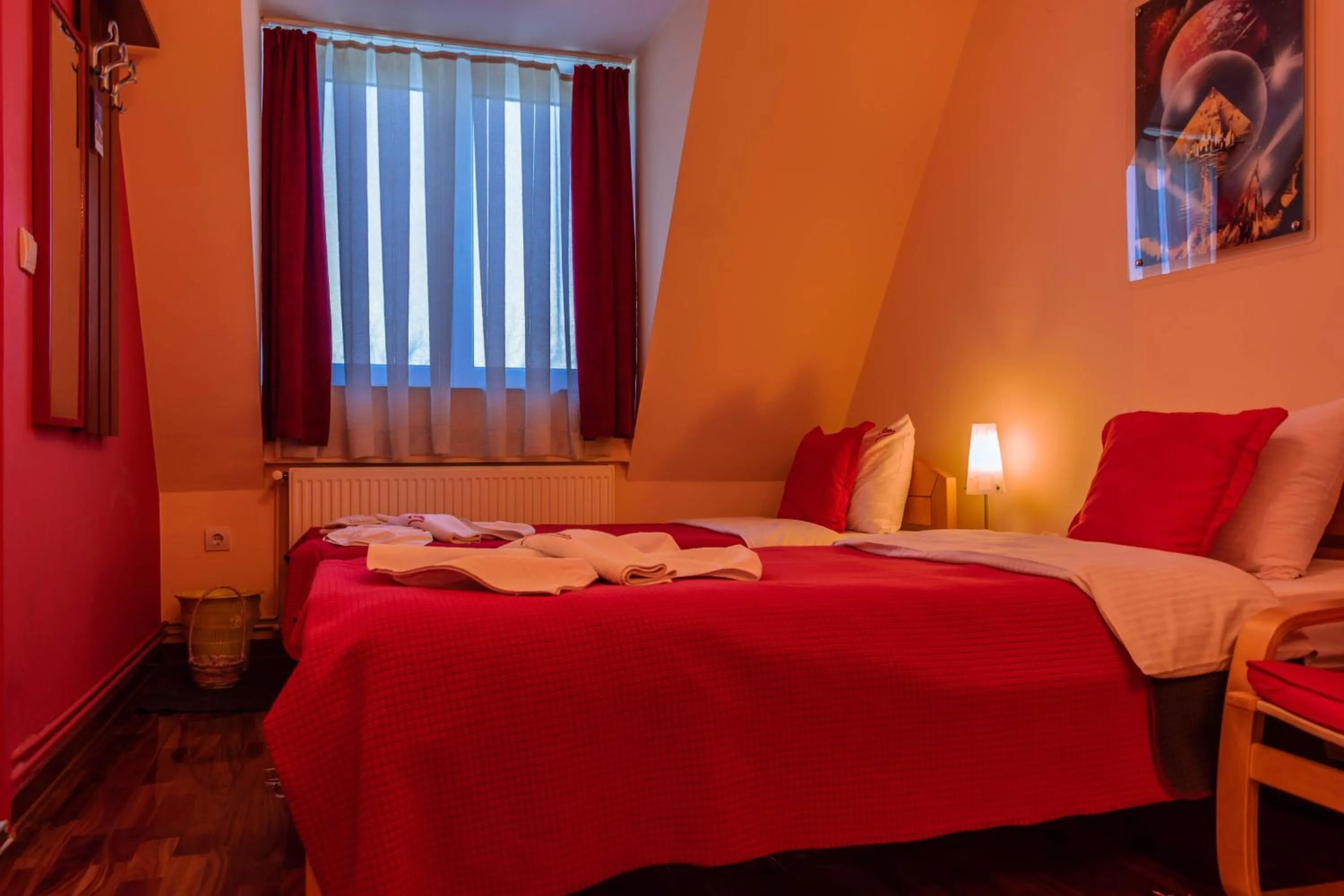 Bed in Garni Hotel Lama