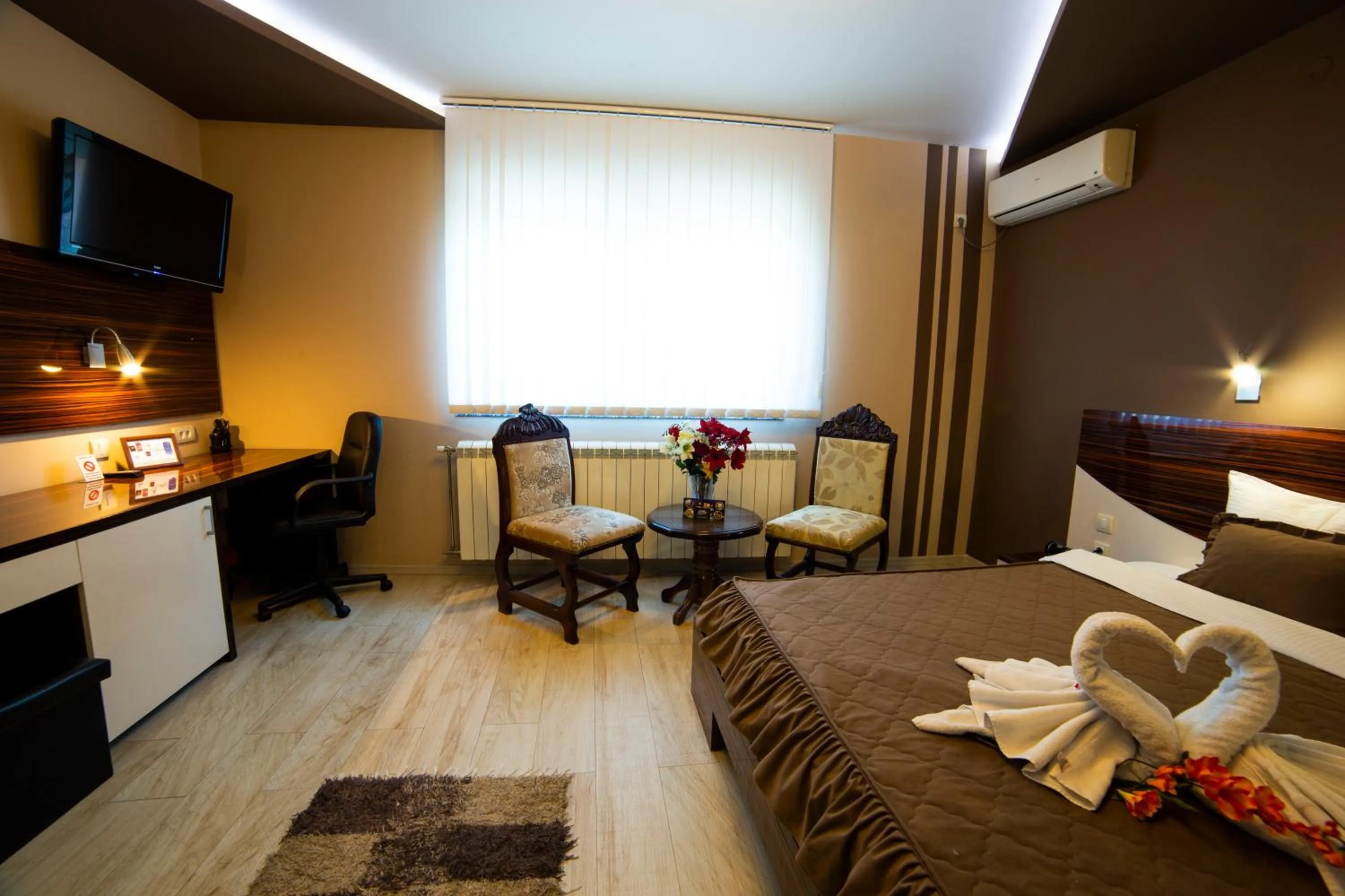 Bed in Garni Hotel Lama