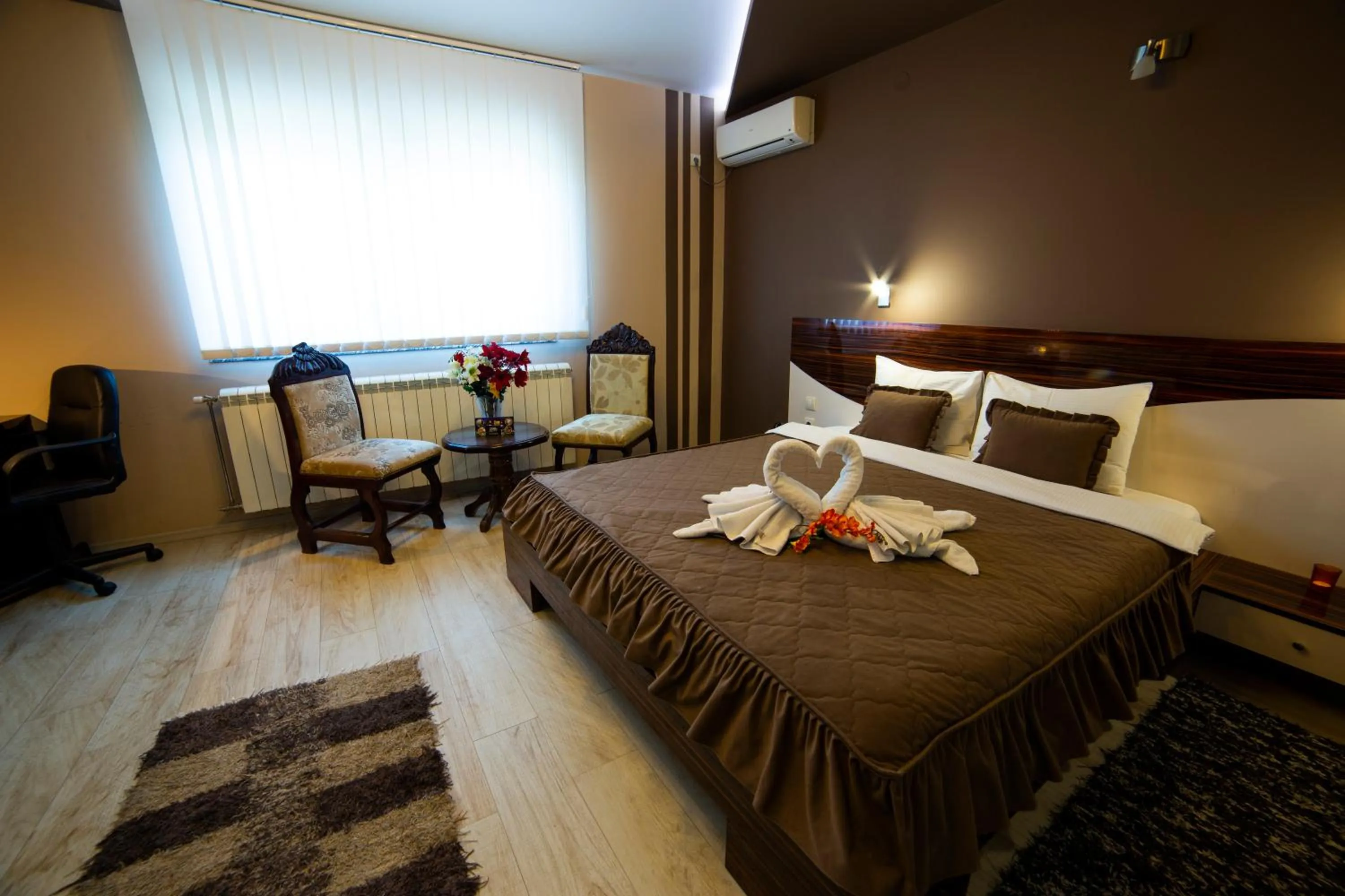 Bed in Garni Hotel Lama