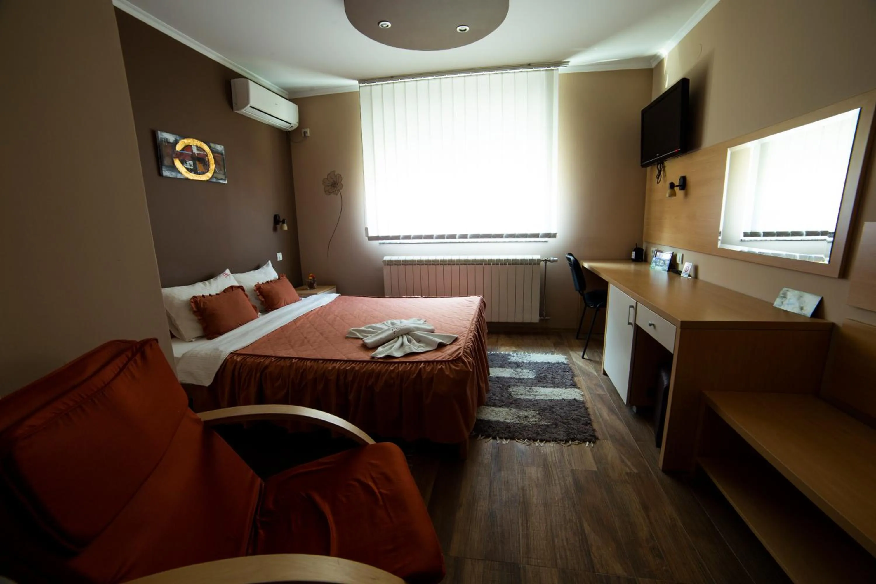 Bed in Garni Hotel Lama