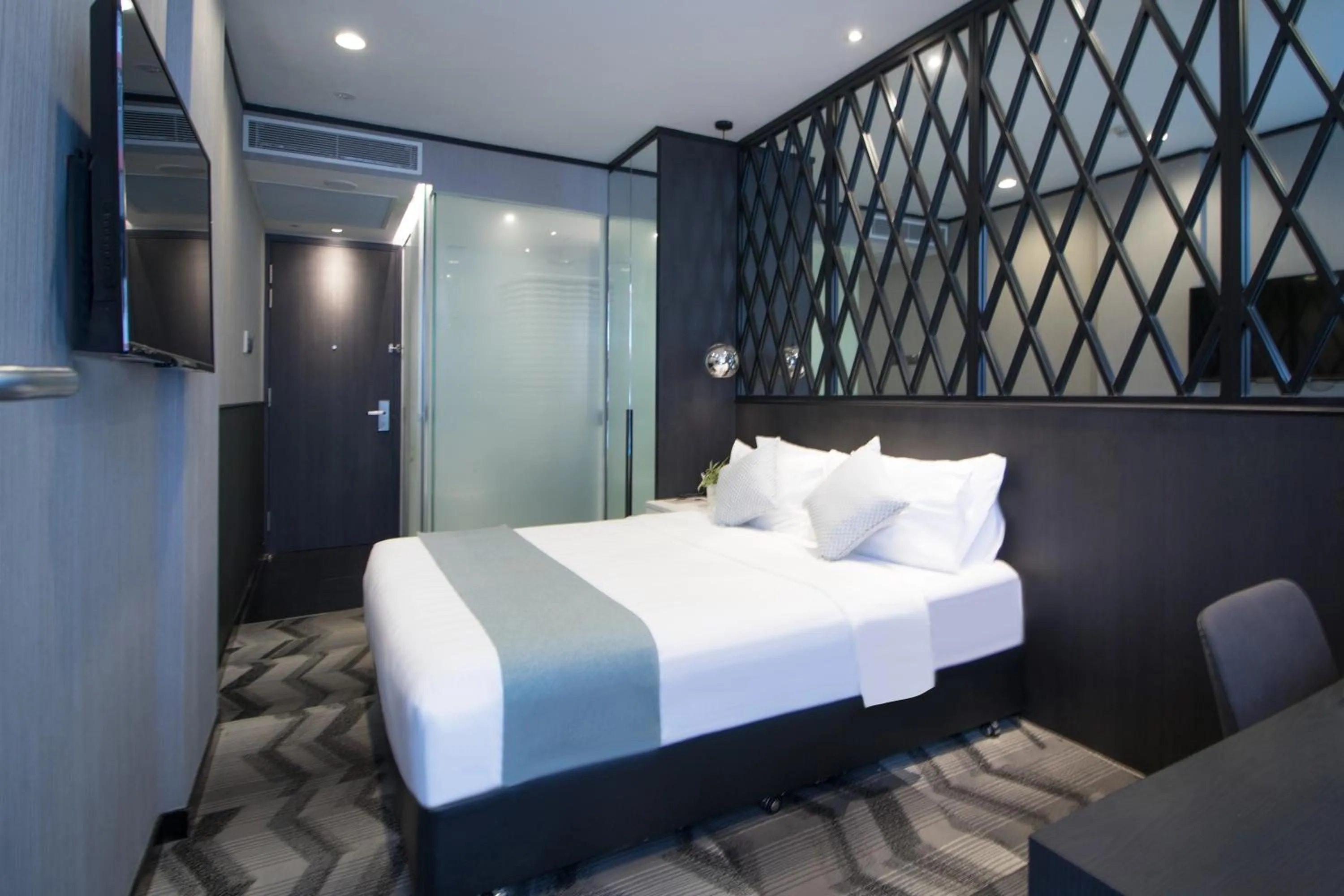 Bed in Hotel NuVe Urbane