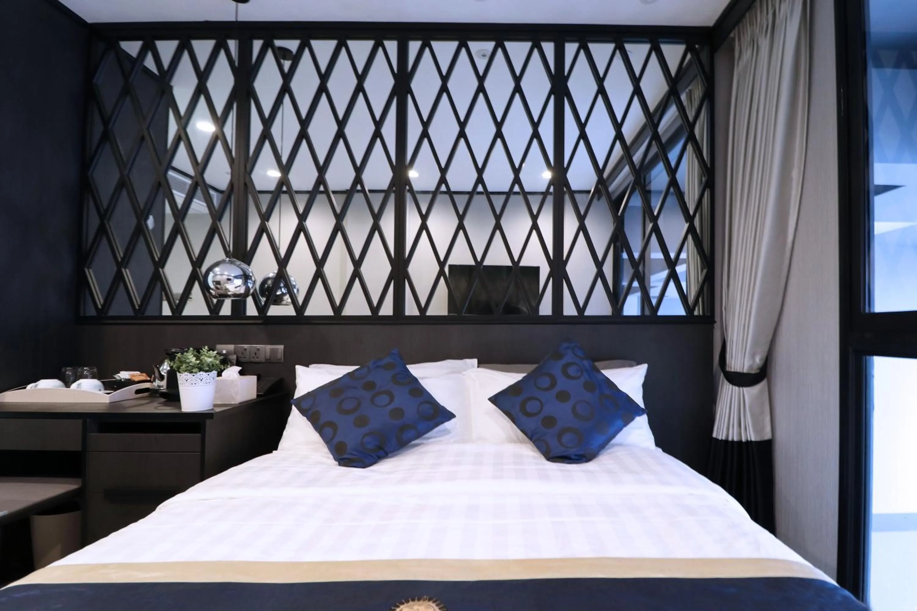 Photo of the whole room, Bed in Hotel NuVe Urbane