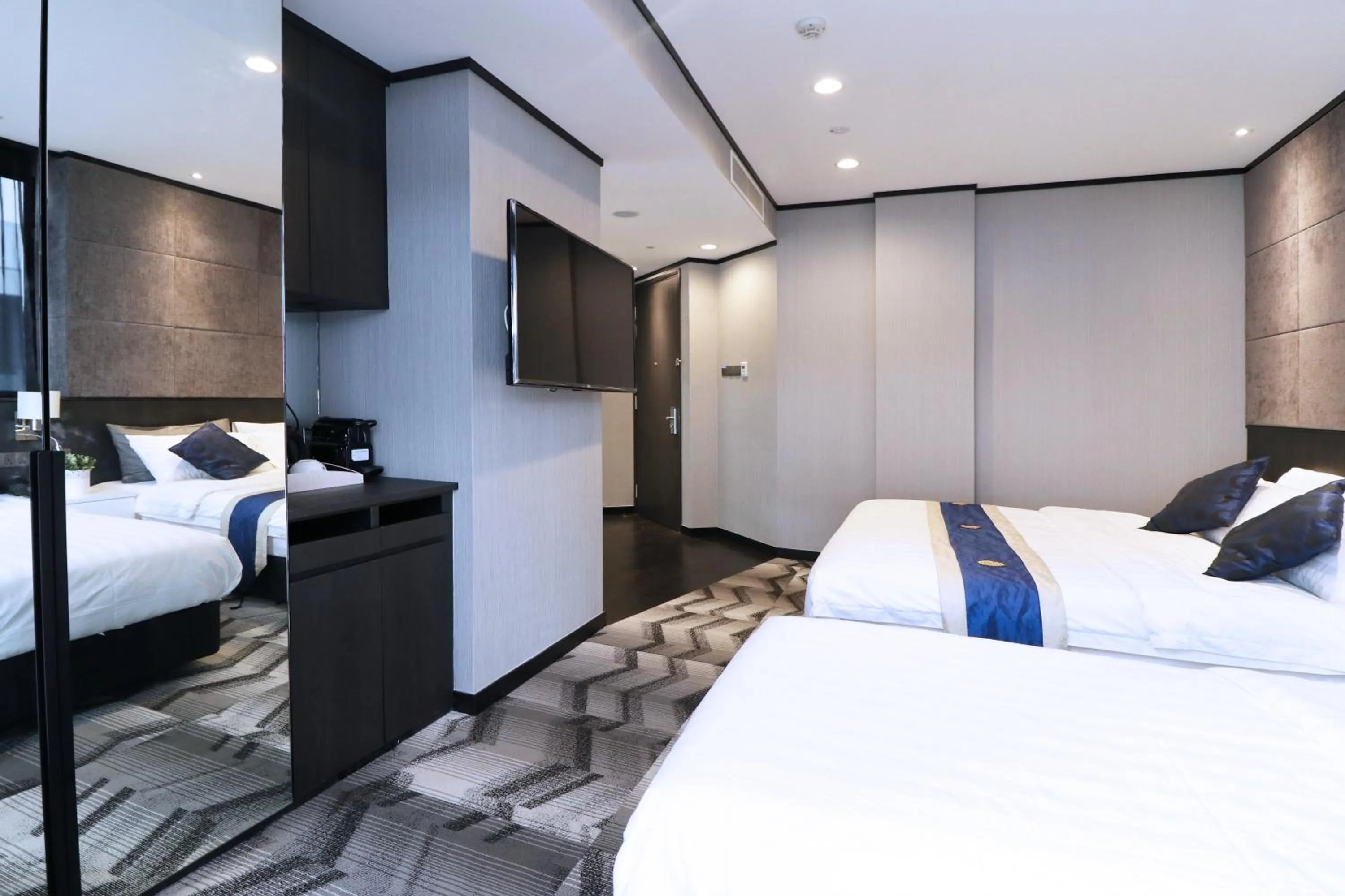 Photo of the whole room, Bed in Hotel NuVe Urbane