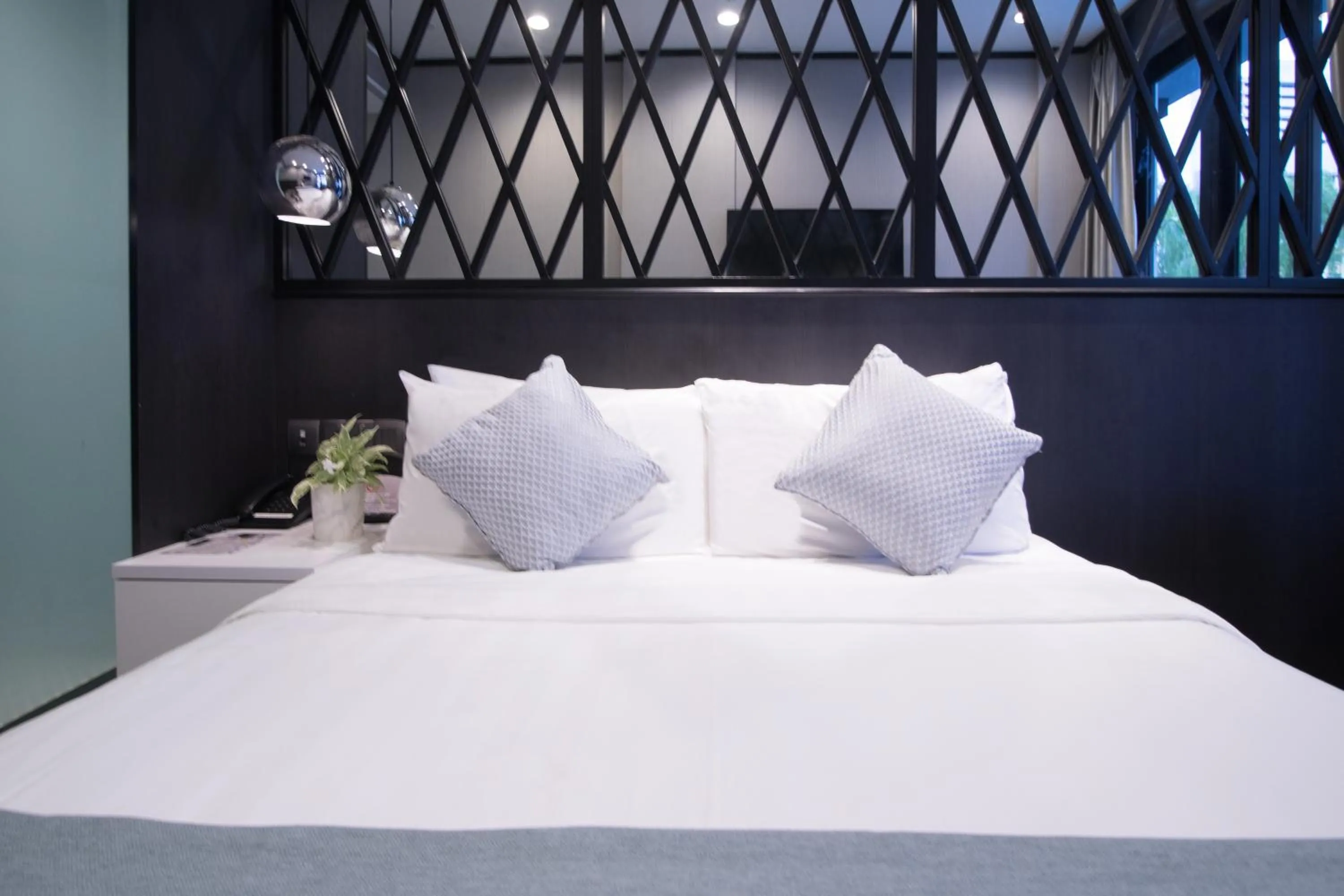 Bed in Hotel NuVe Urbane