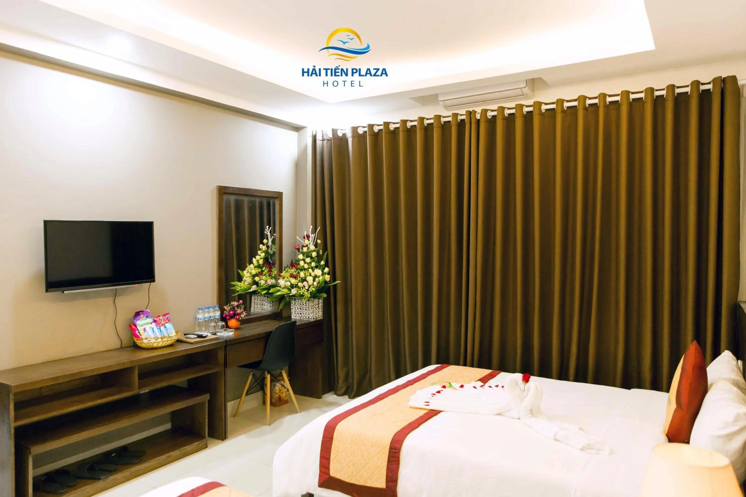 Bed in Hai Tien Plaza Hotel