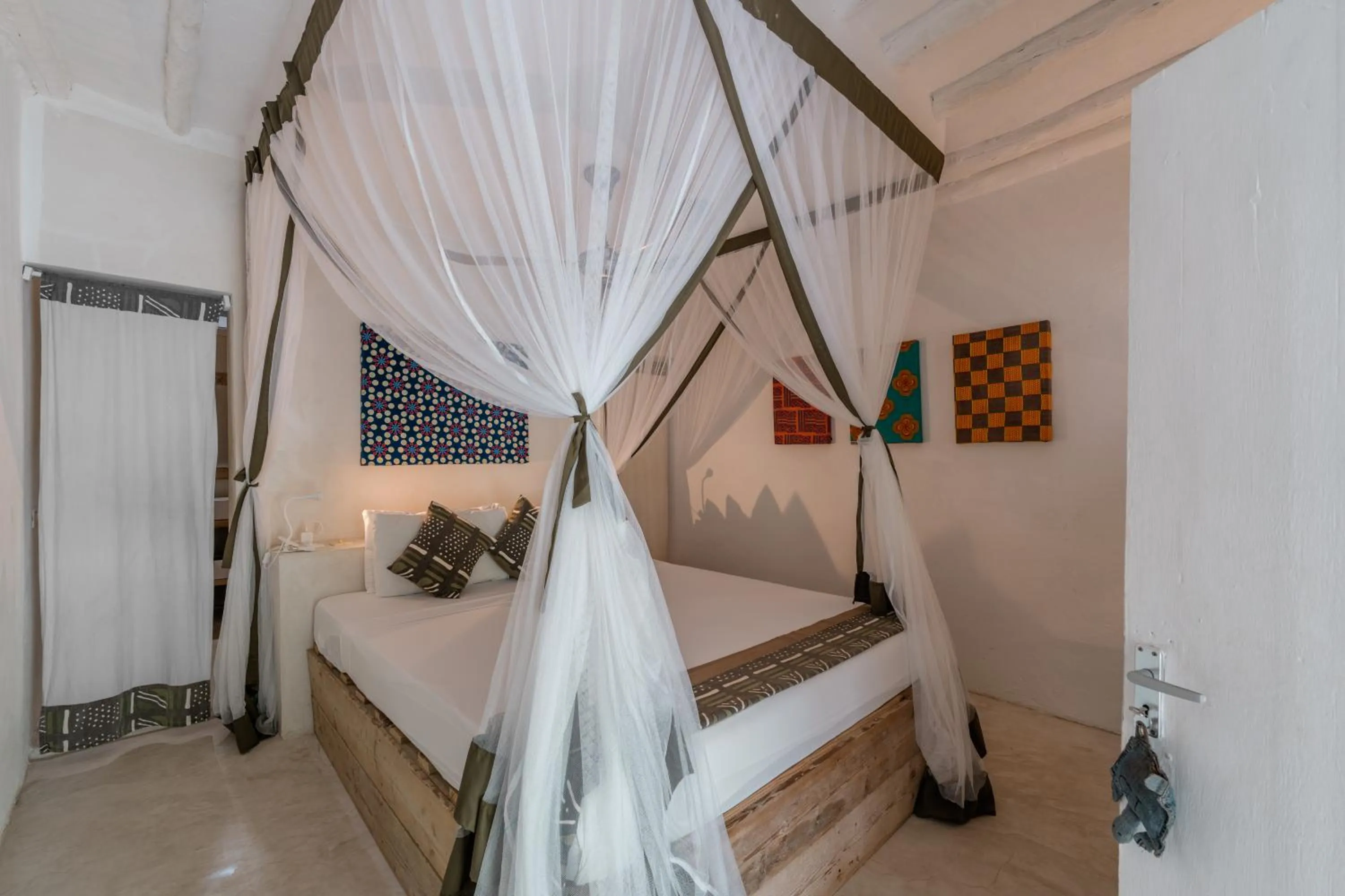 Bed in The Loop Beach Resort