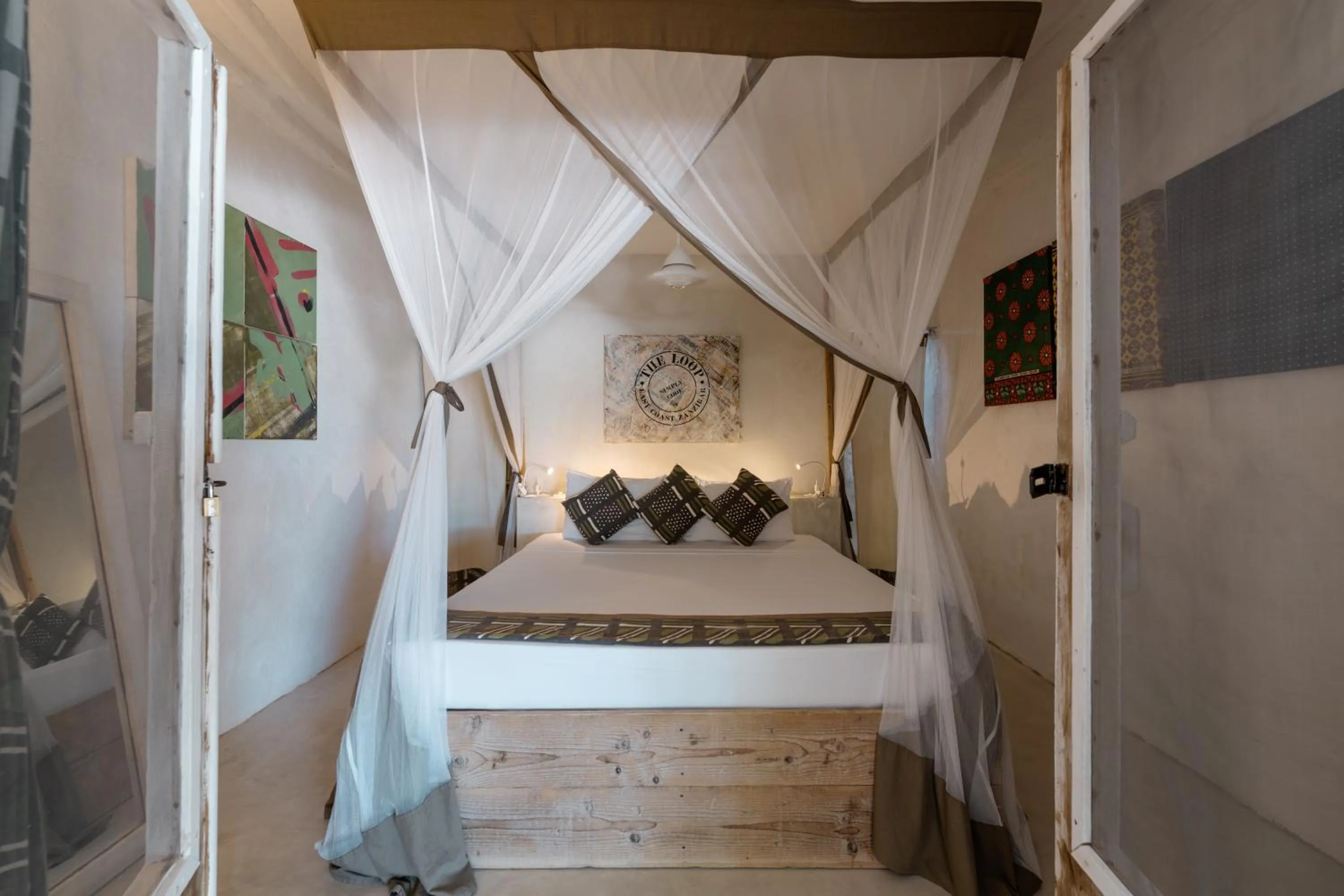 Bed in The Loop Beach Resort