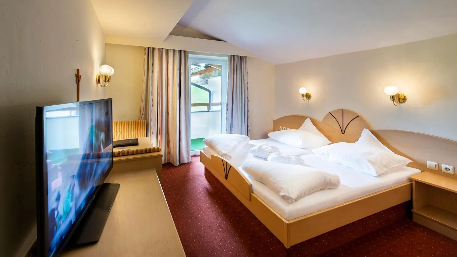 Bed in Hotel Gasteigerhof