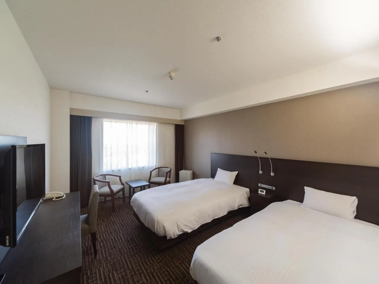 Bedroom, Bed in KKR Hotel Nagoya