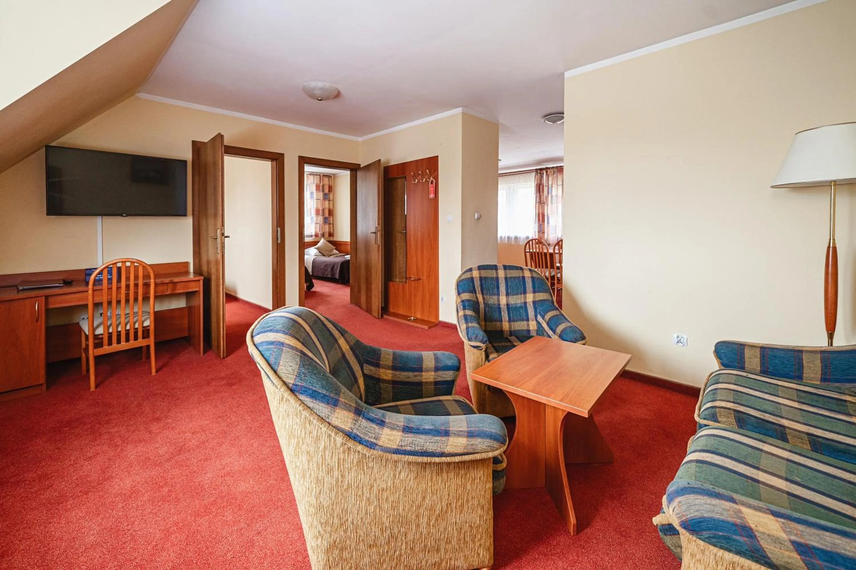 Communal lounge/ TV room in Kompleks Antałówka Termy & Med