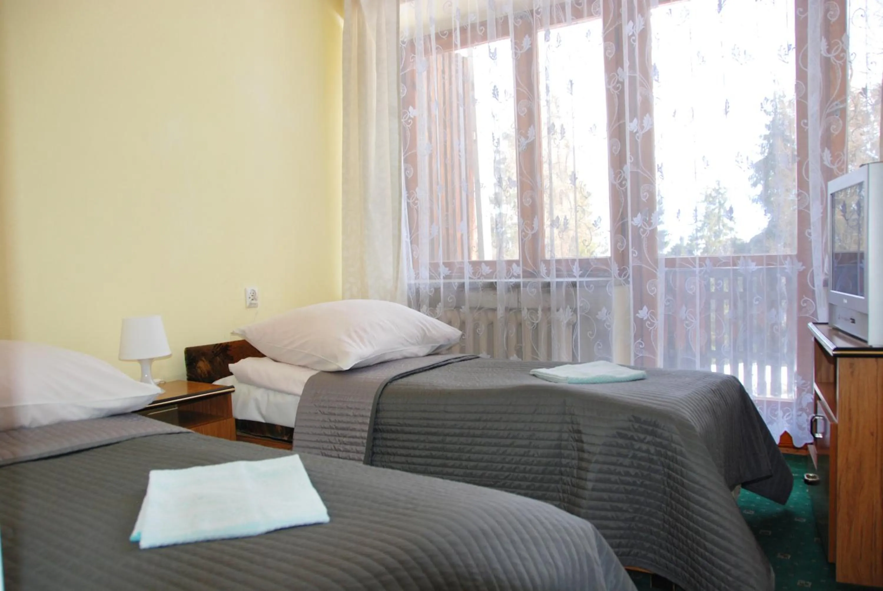 Bed in Zespół Tatry - Hotel Tatry i Budynek Turystyczny