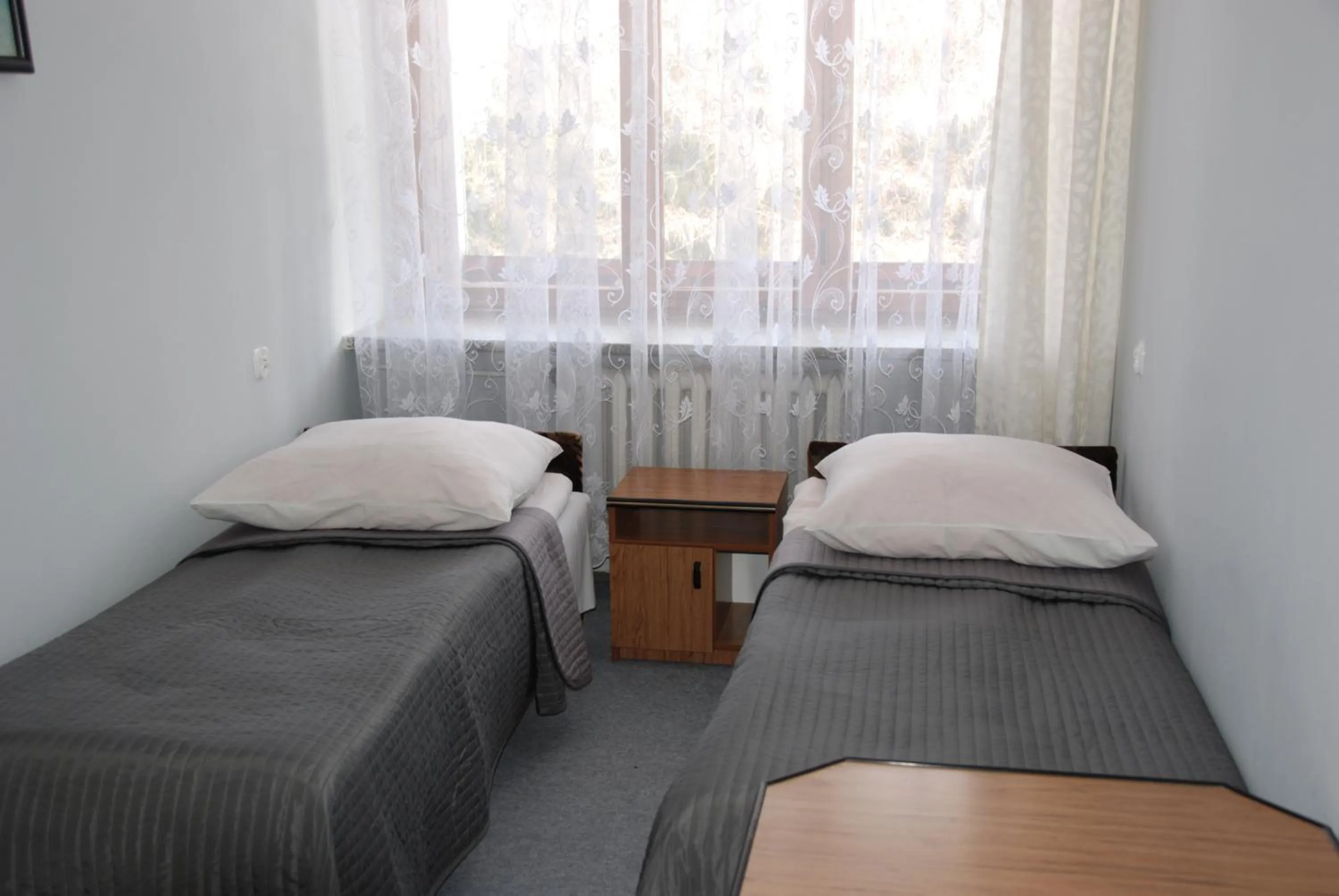 Bed in Zespół Tatry - Hotel Tatry i Budynek Turystyczny