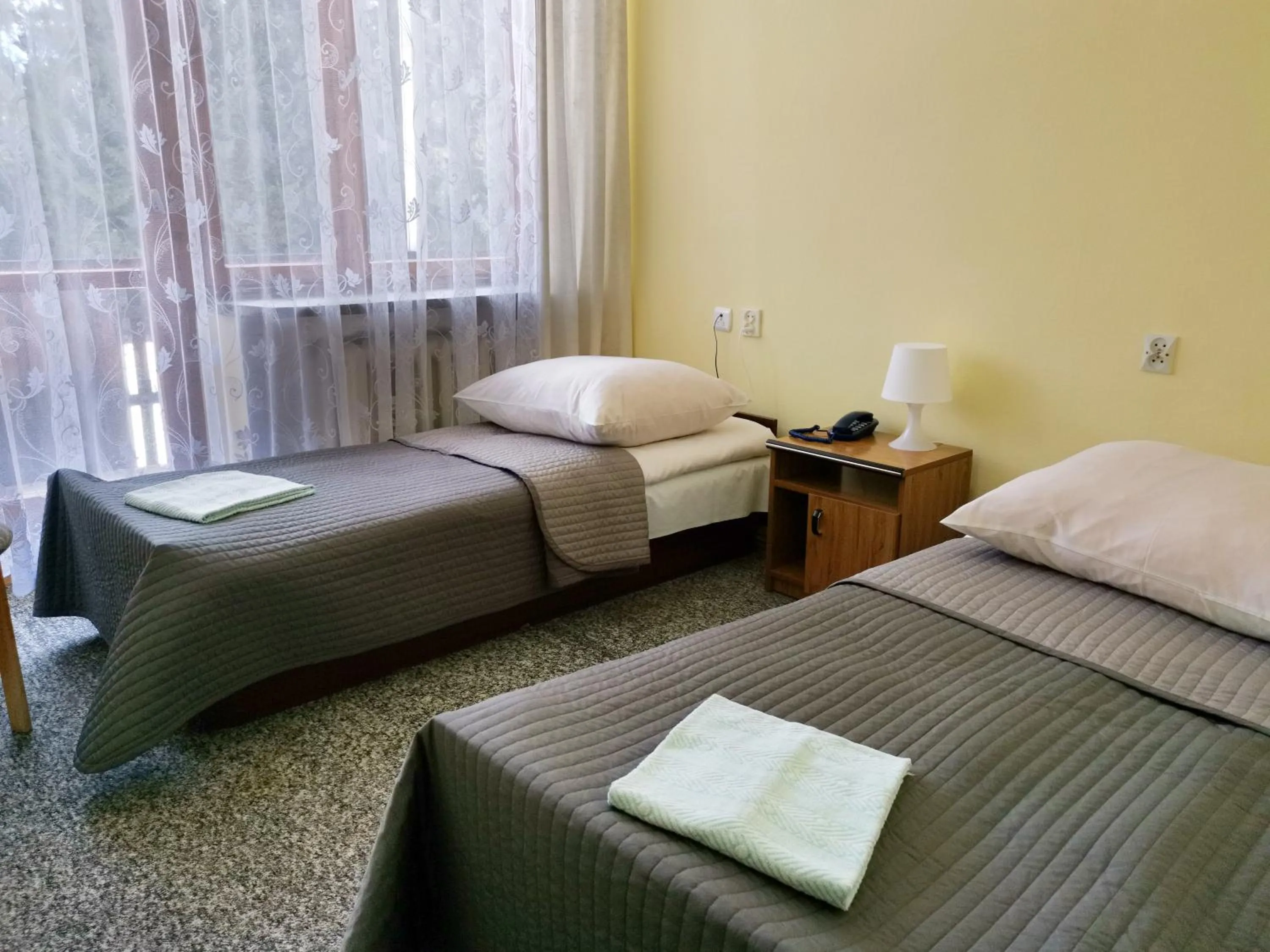 Bed in Zespół Tatry - Hotel Tatry i Budynek Turystyczny