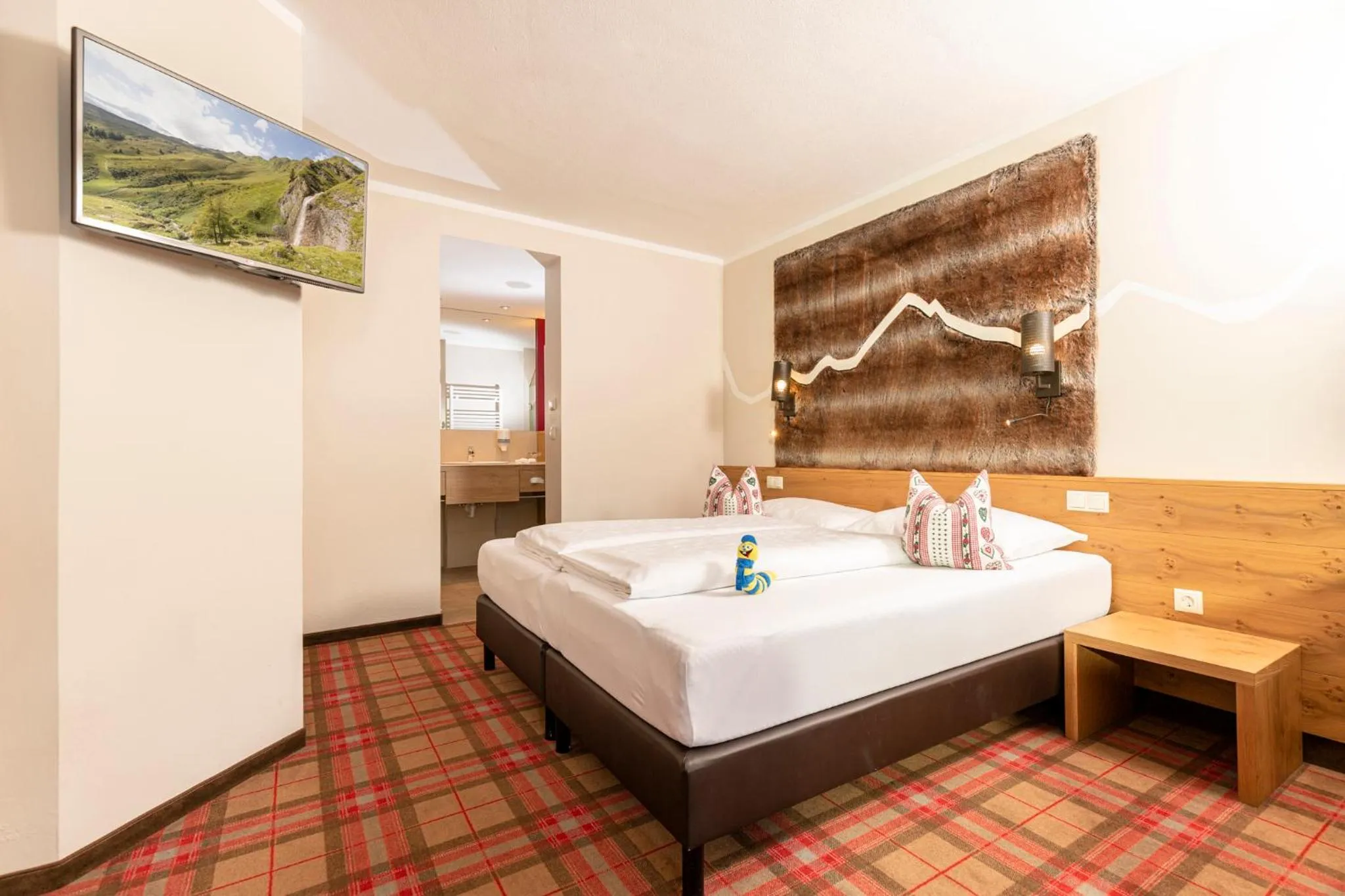 Photo of the whole room, Bed in Kinder- & Gletscherhotel Hintertuxerhof