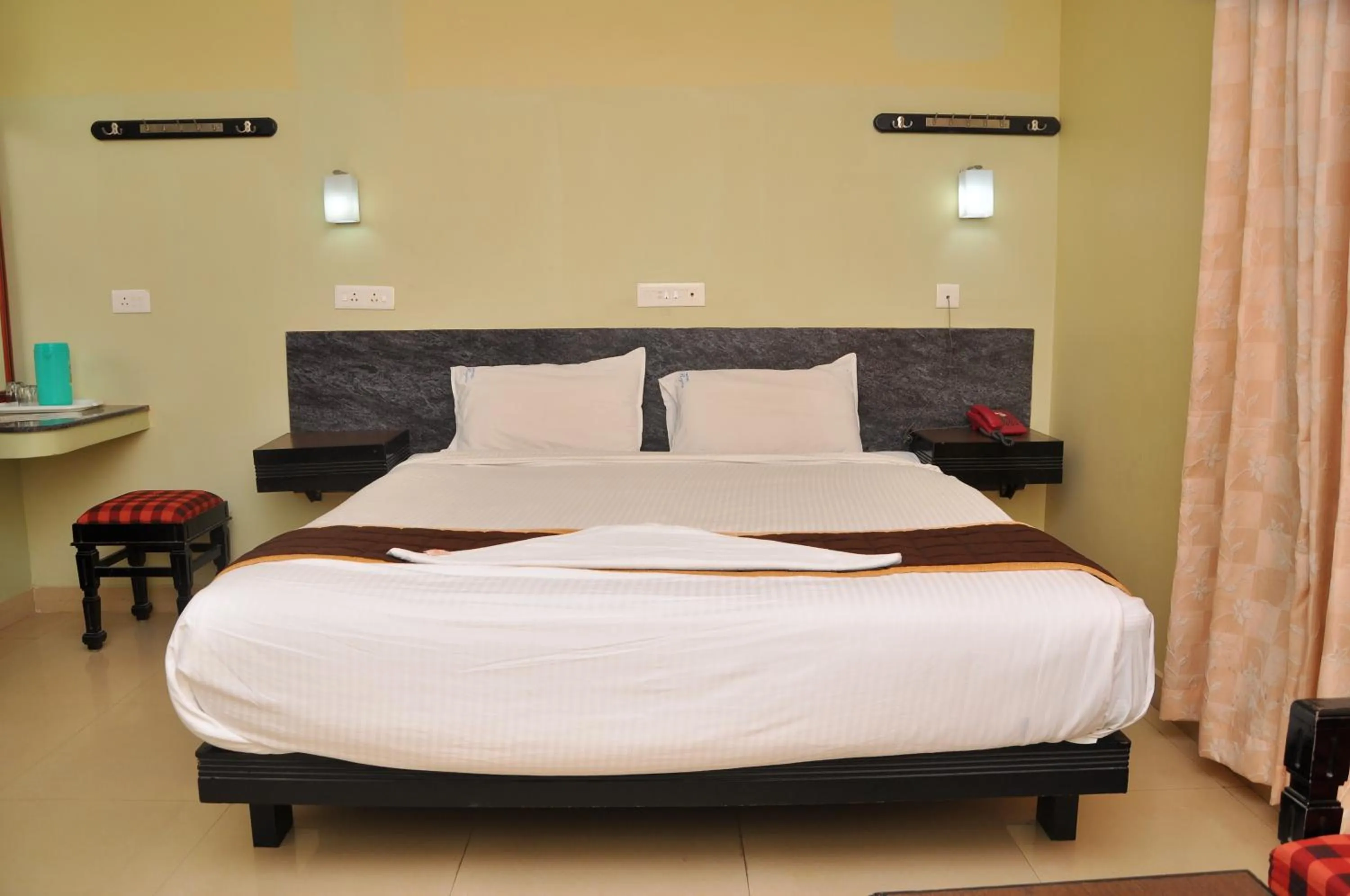 Bed in Hotel Rajam