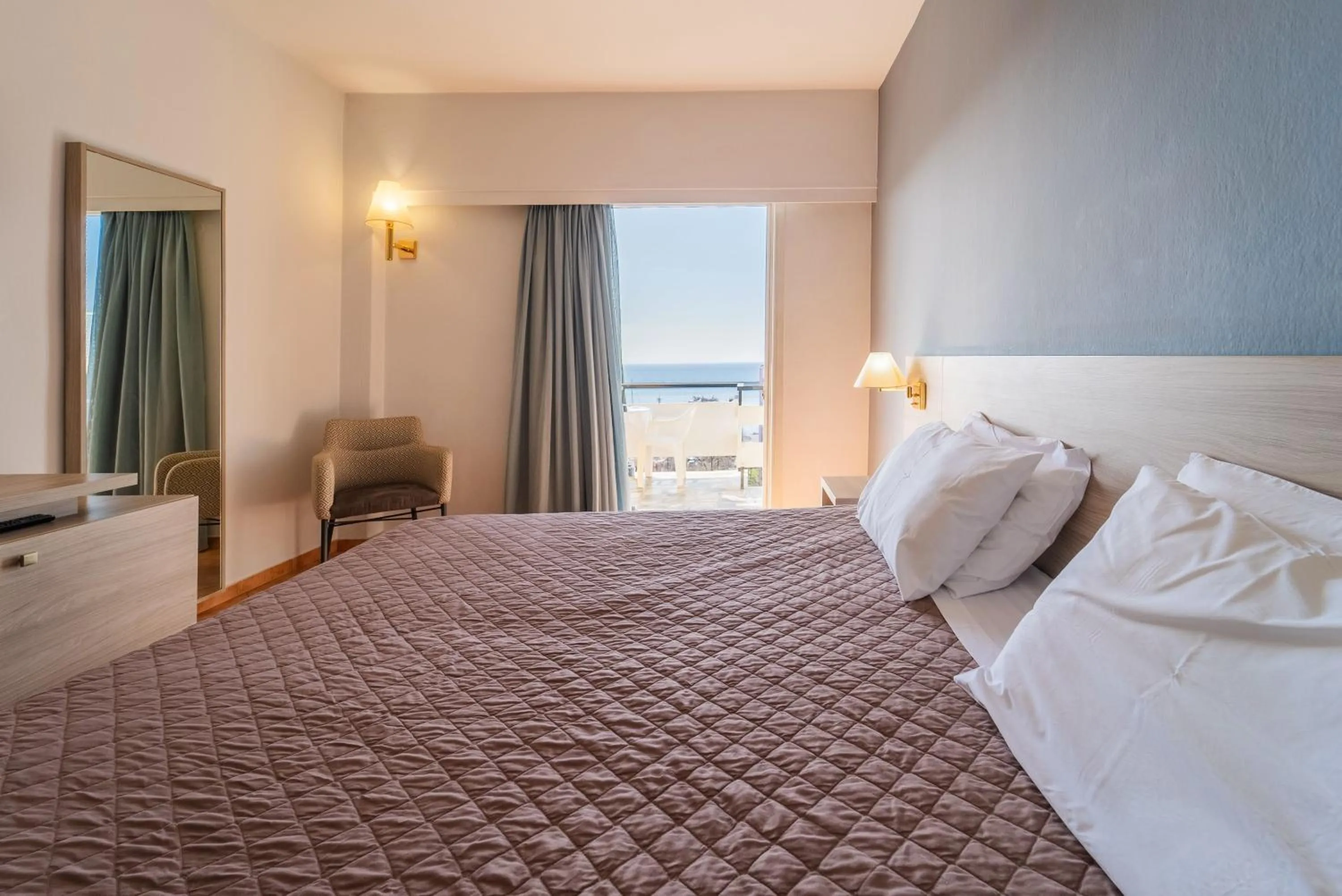 Bed in Oceanis Hotel