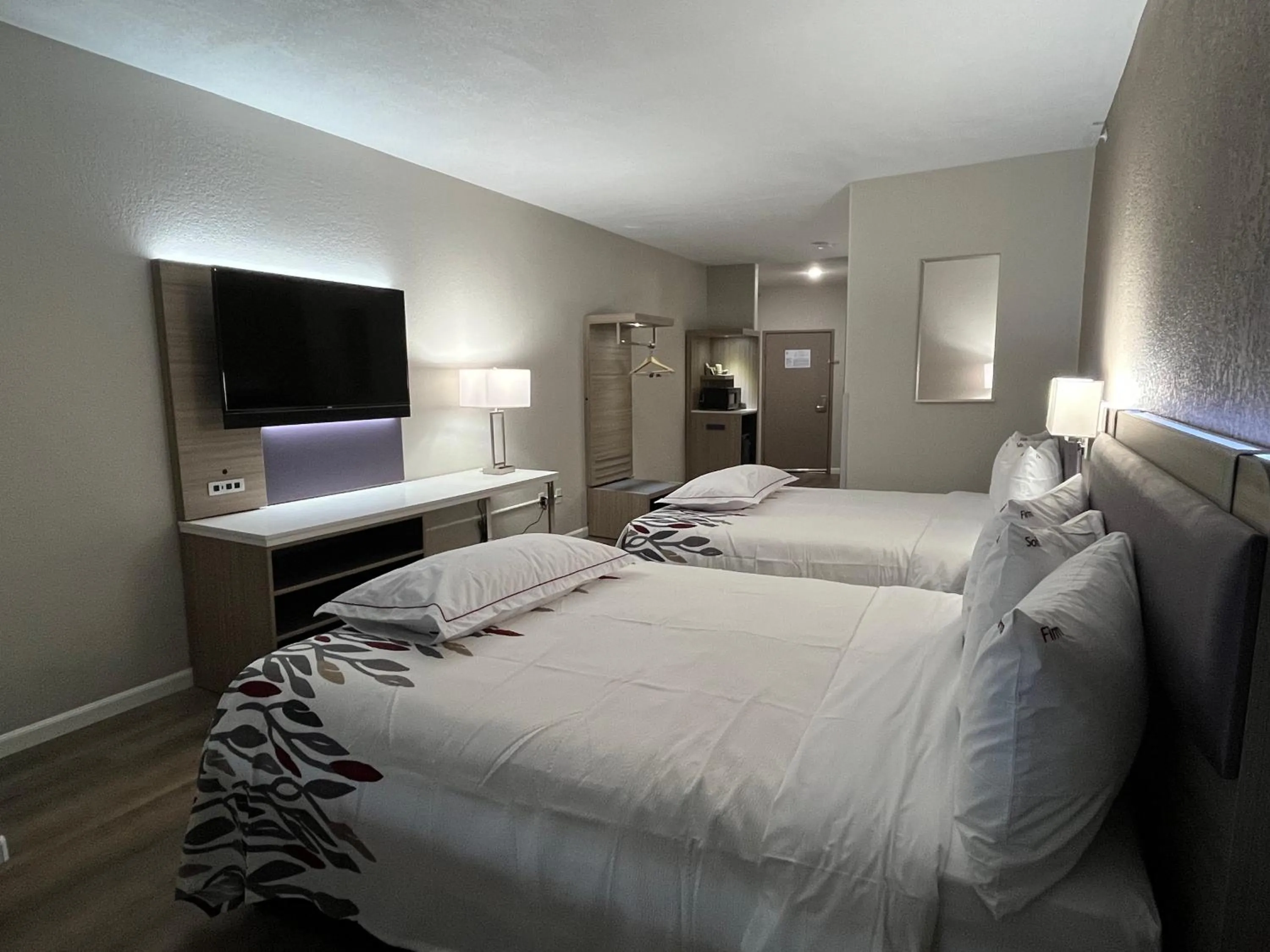 Bed in Quality Suites North IH 35