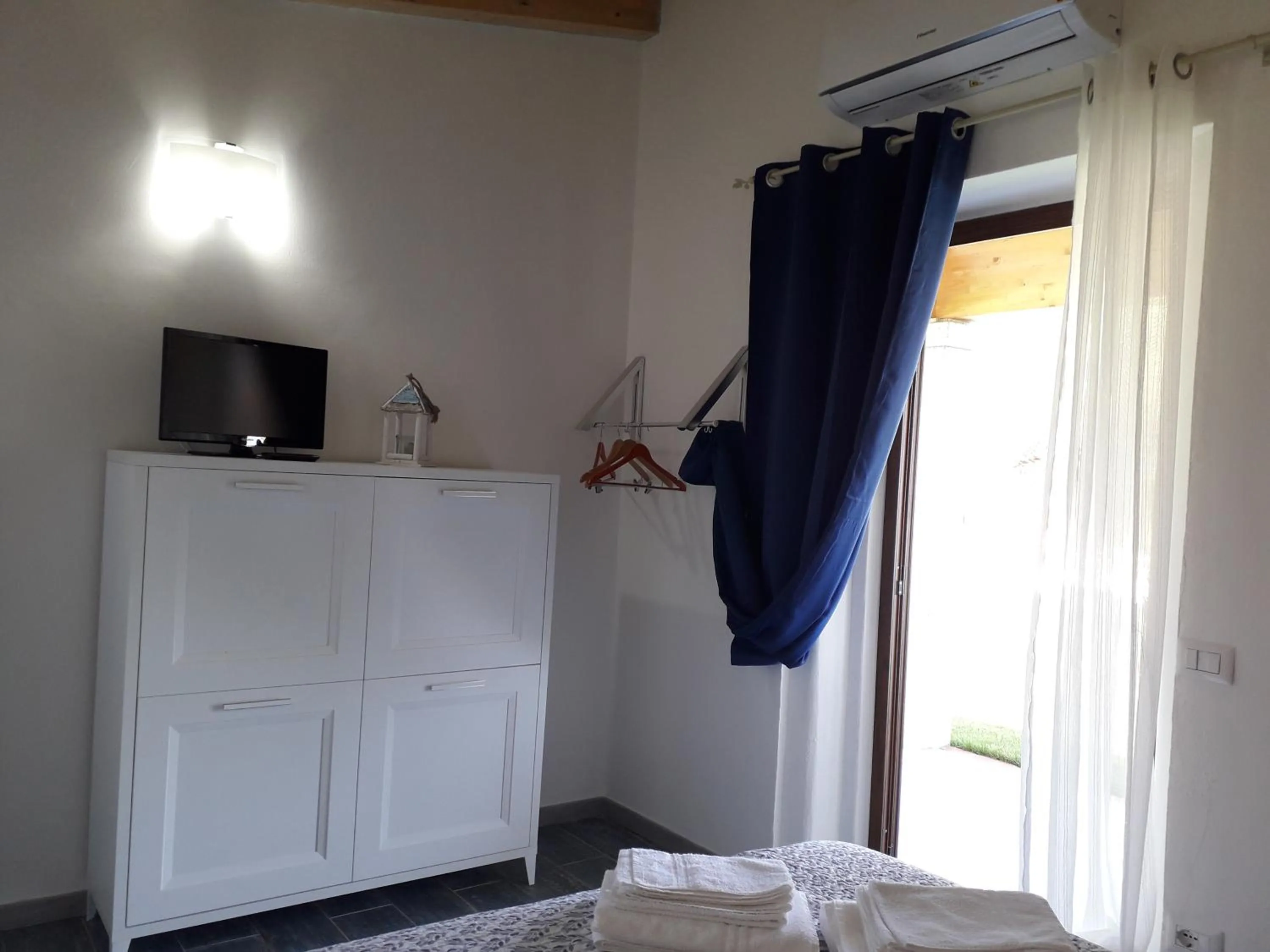 TV and multimedia in SardAma B&B Affittacamere