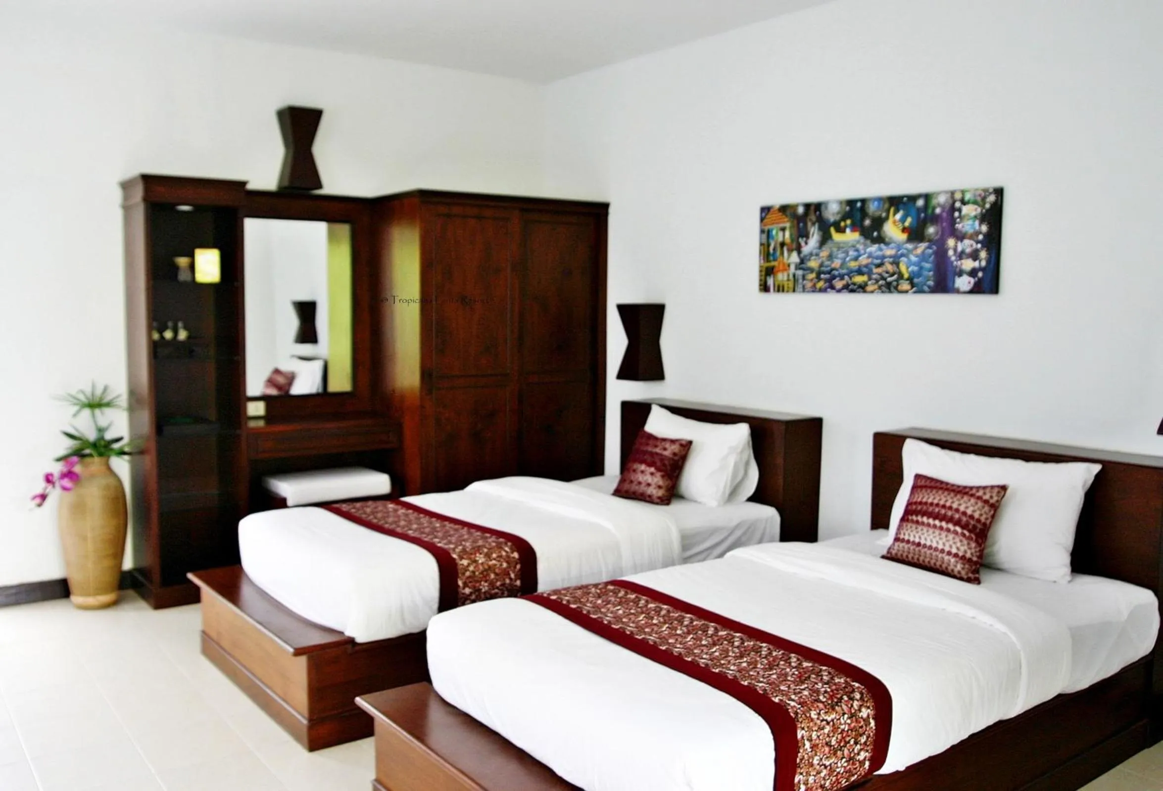 Bed in Tropicana Lanta Resort