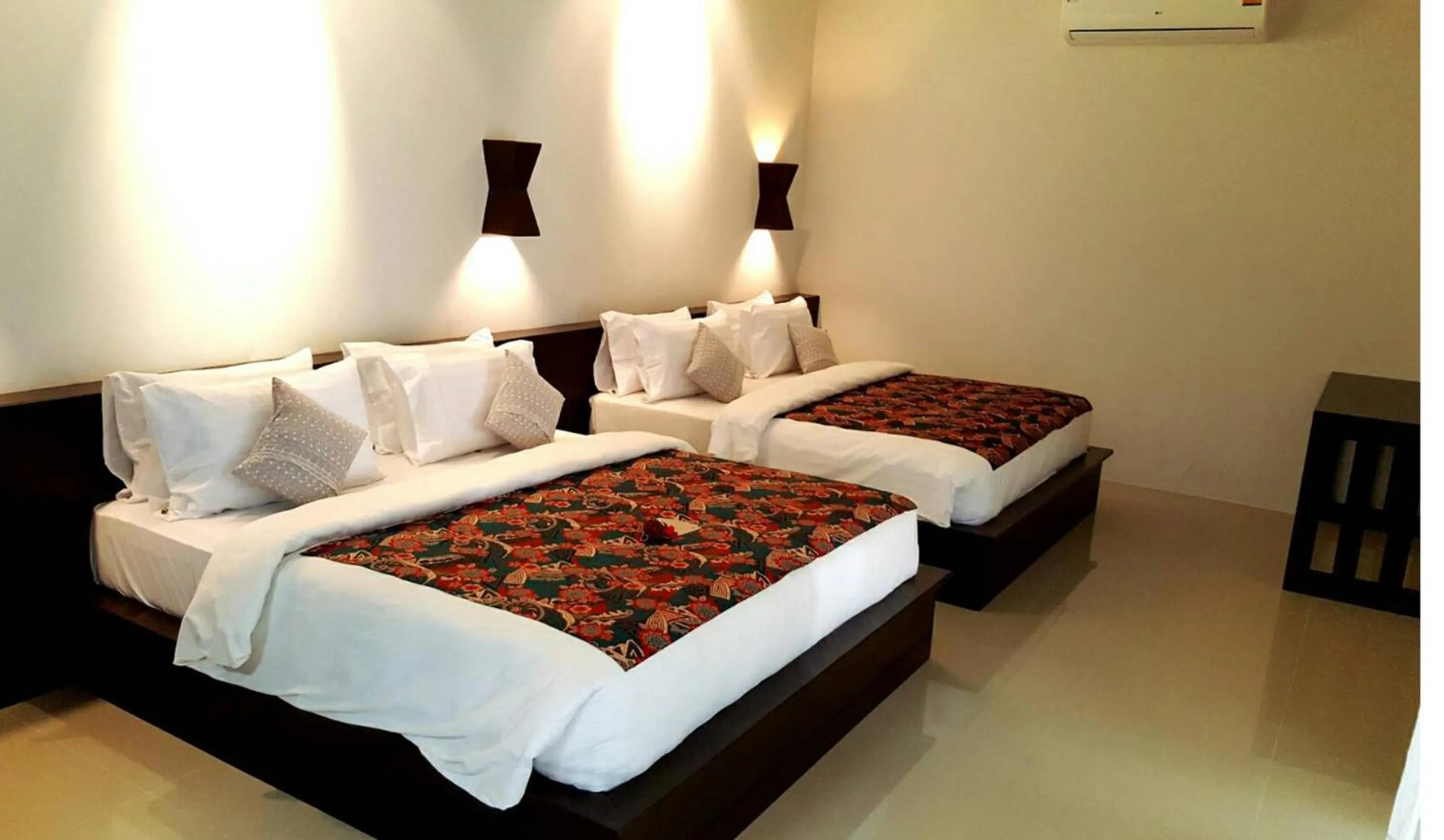 Bed in Tropicana Lanta Resort