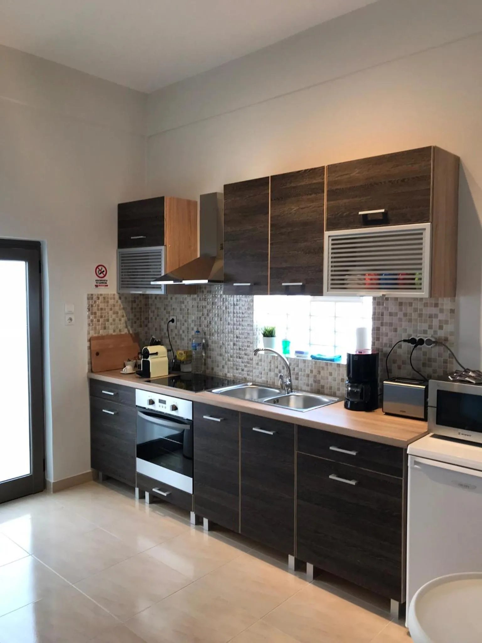 Kitchen or kitchenette in Dina's House