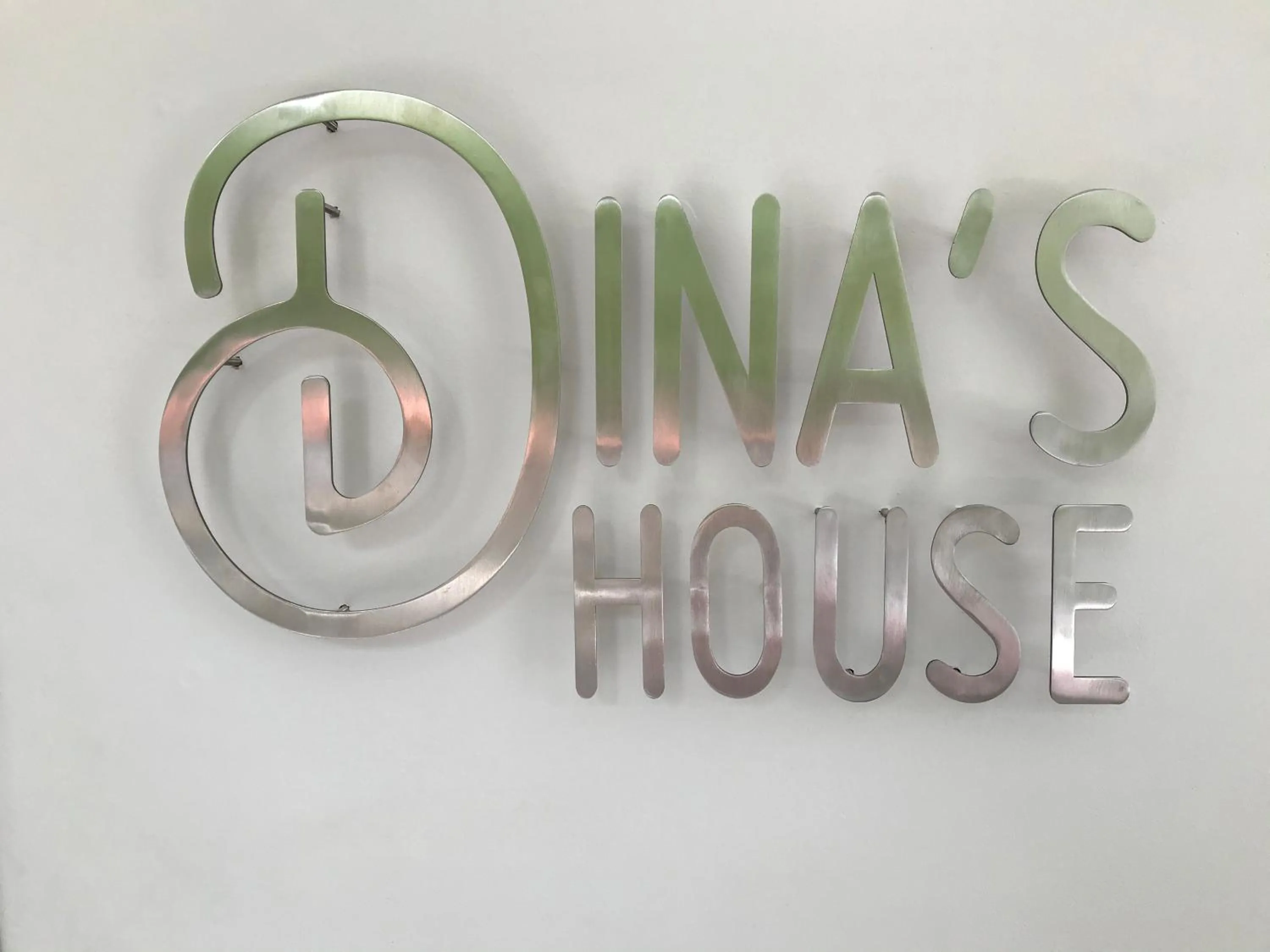 Property logo or sign in Dina's House