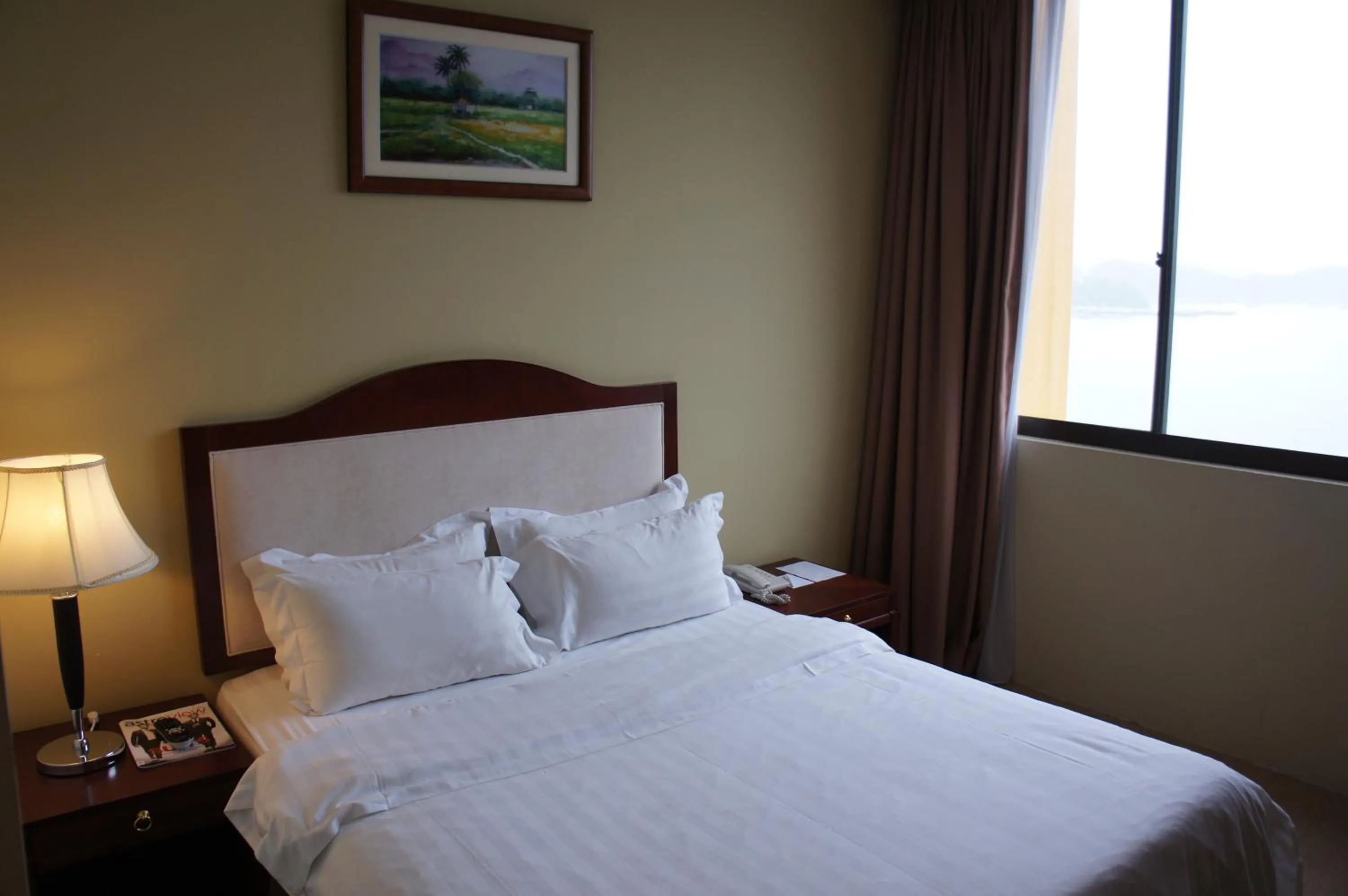 Bed in Gaya Centre Hotel