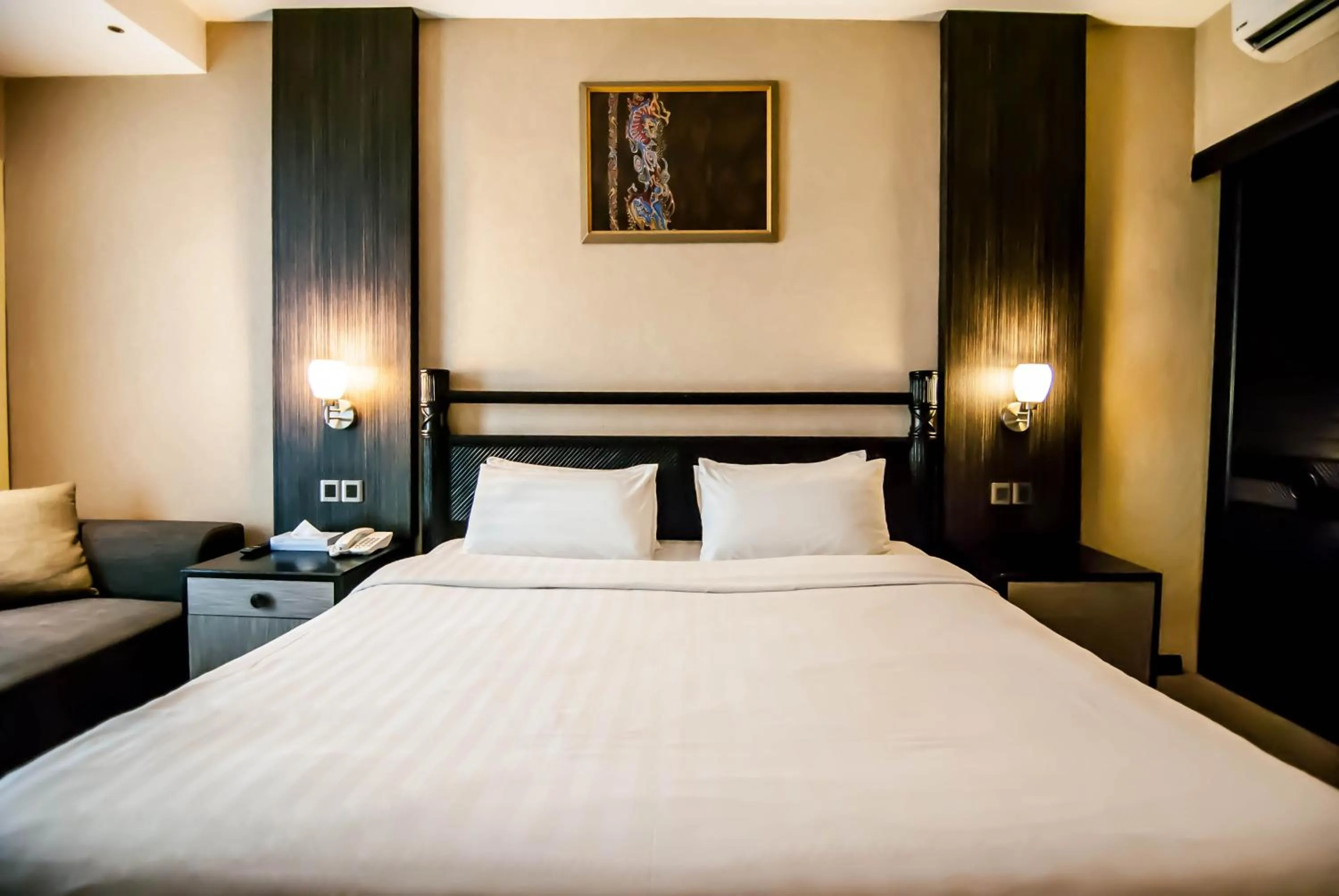 Bed in KK Times Square Hotel