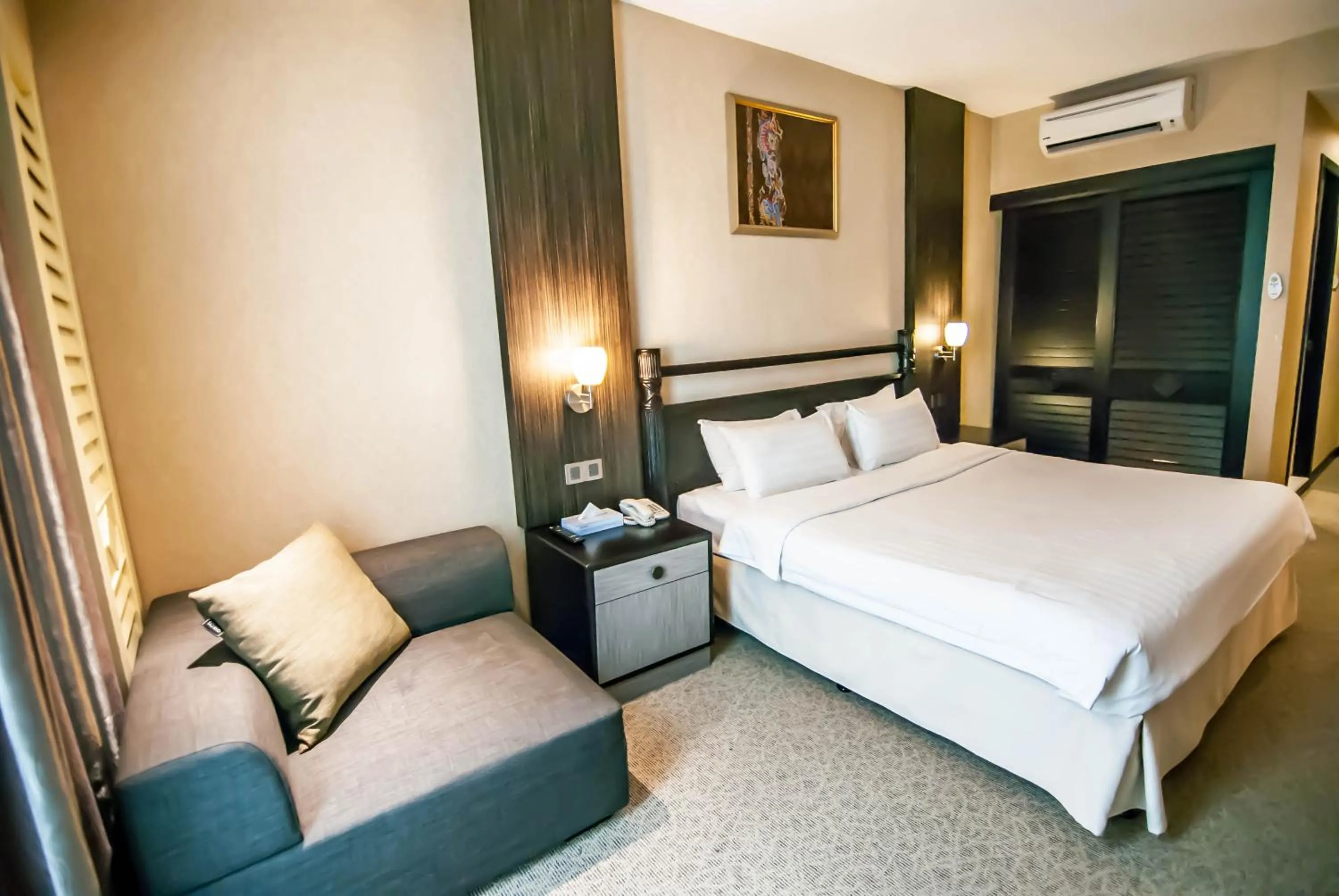 Bed in KK Times Square Hotel