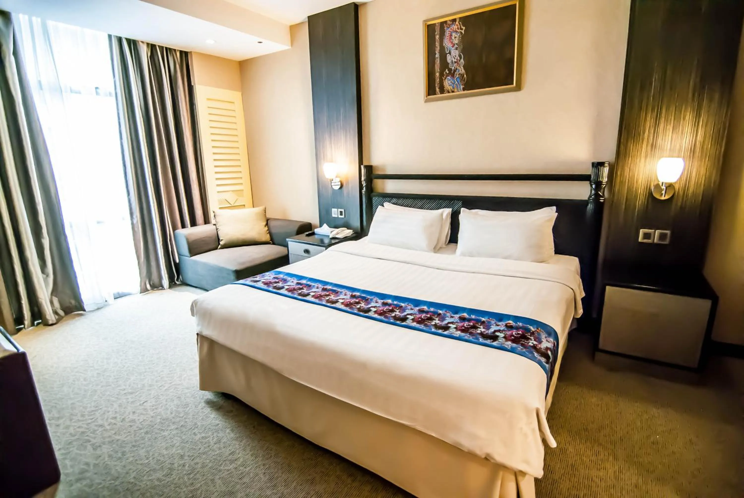 Bed in KK Times Square Hotel